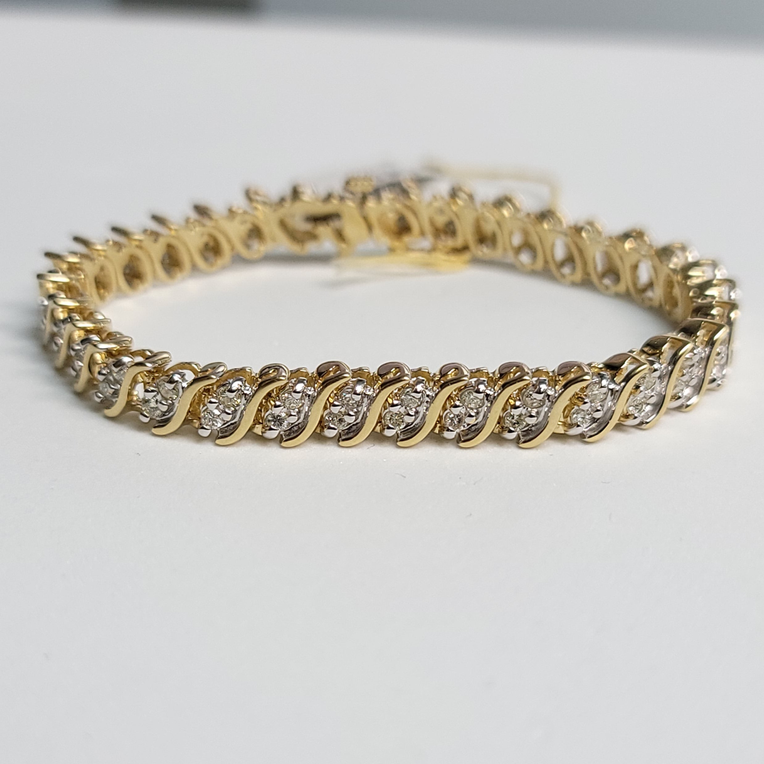 Pulsera de tenis con diamantes estilo S de 2,10 cts en oro amarillo de 14 k