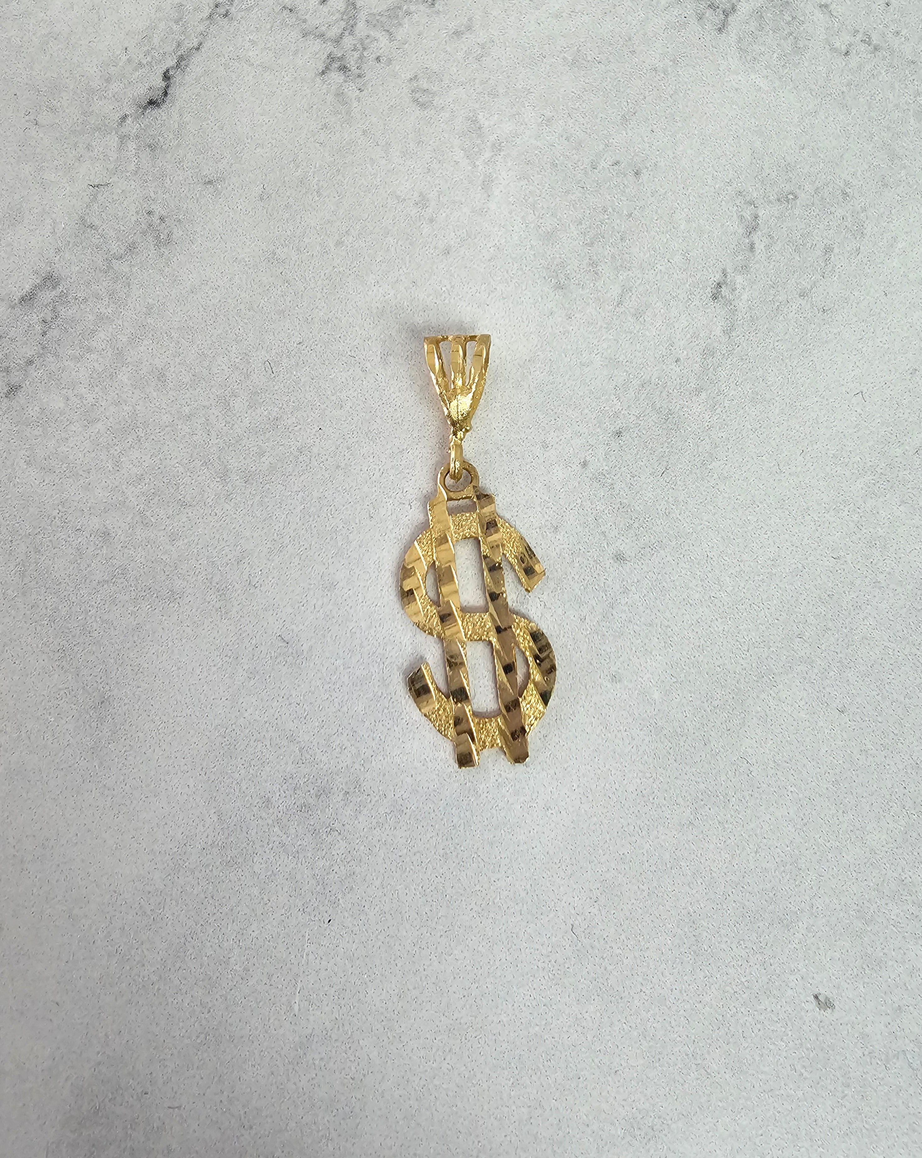 Símbolo de dólar con cortes de diamantes en oro amarillo de 10 k
