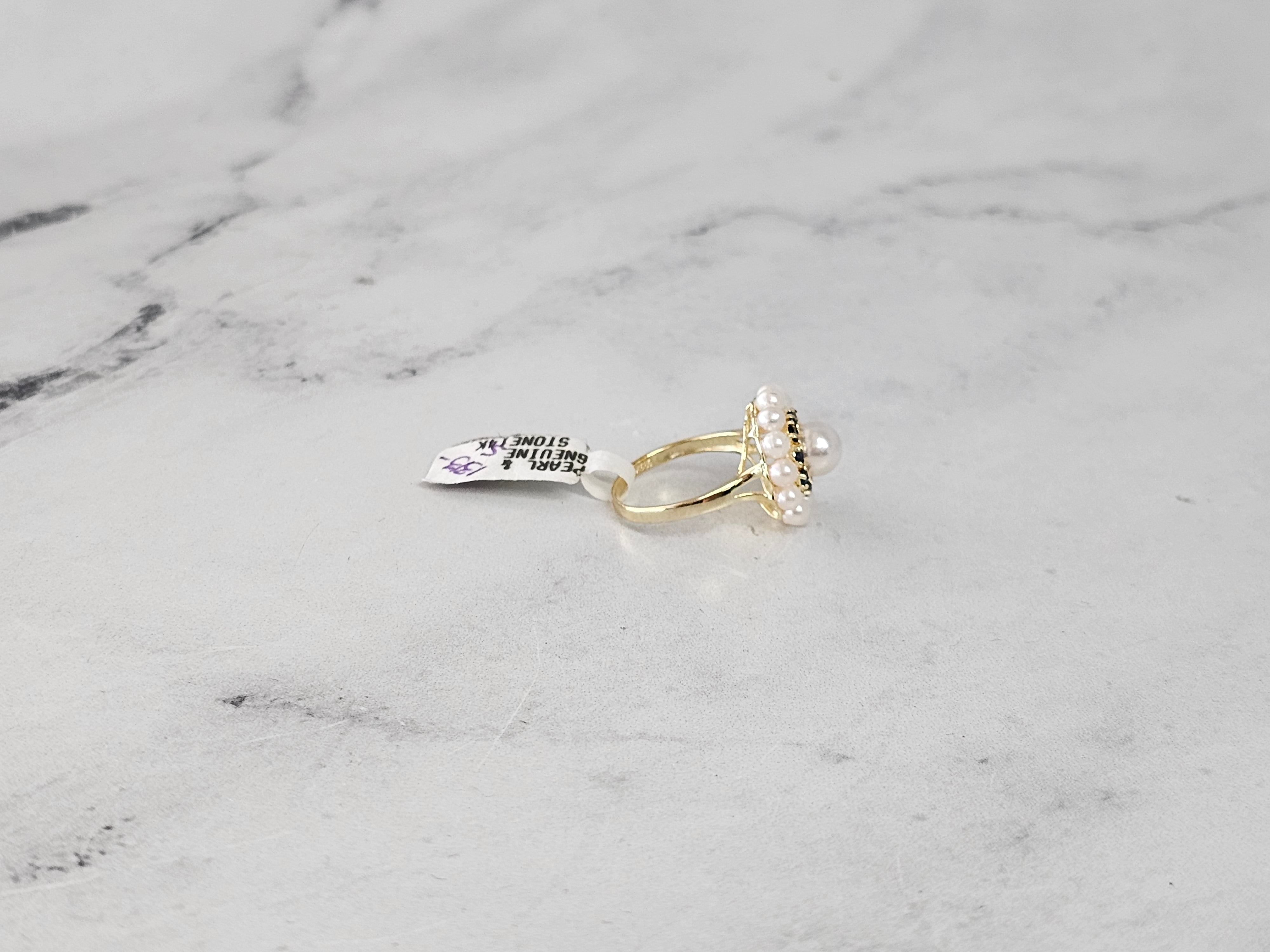 Anillo de oro amarillo de 14 k con doble halo de zafiro y perla