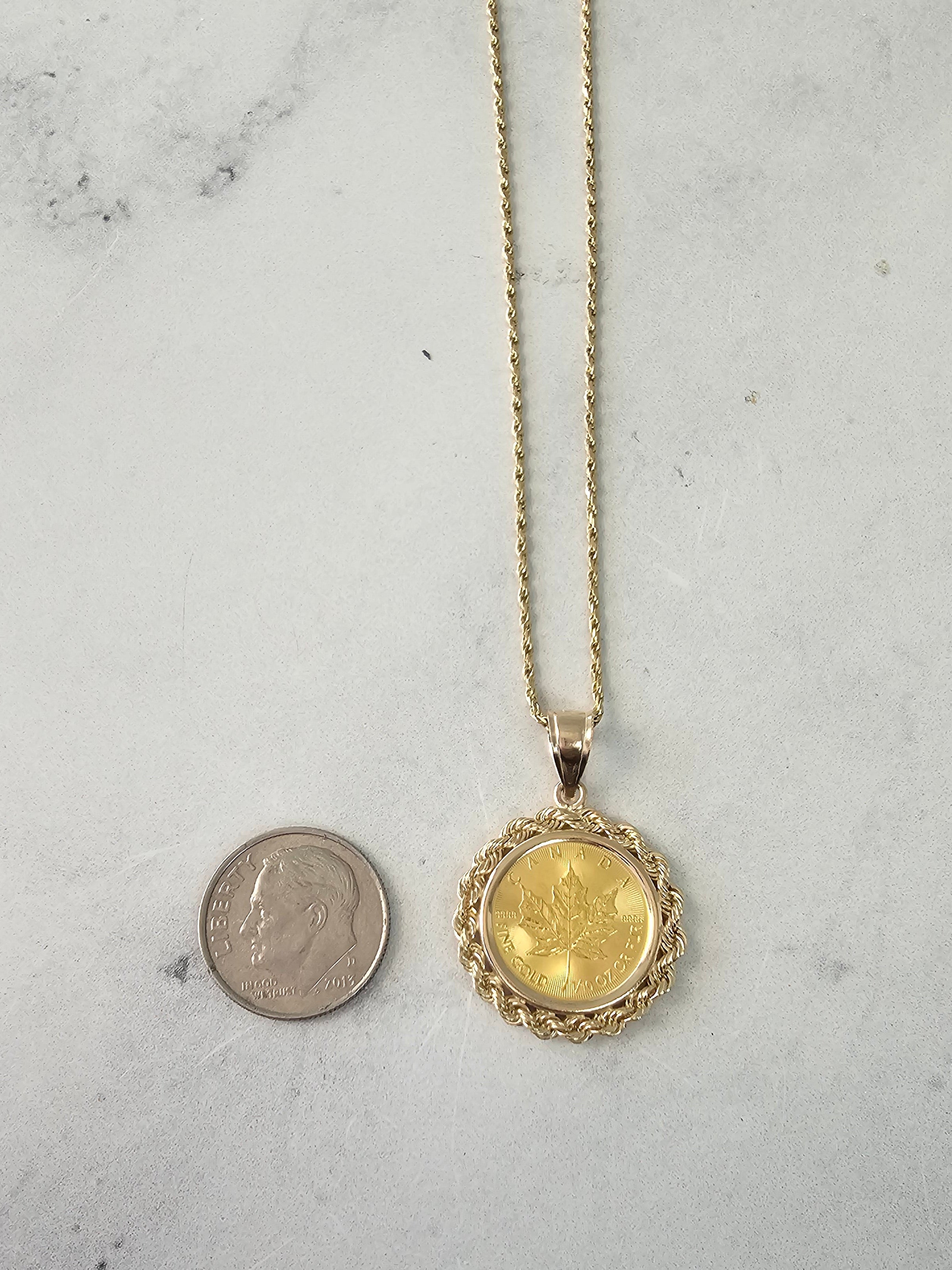 Collar con moneda de hoja de arce canadiense de oro fino de 1/10 oz con bisel de cuerda