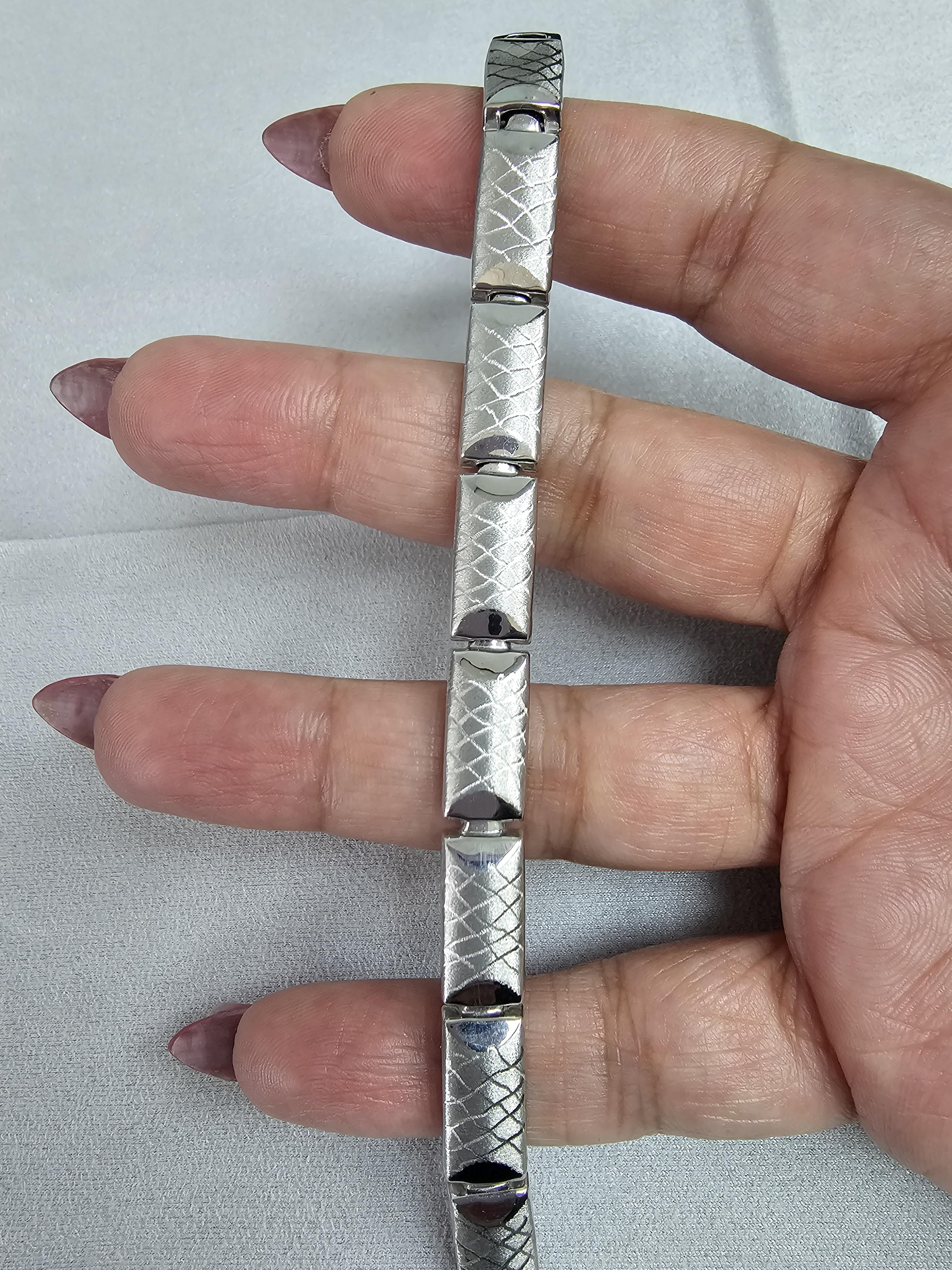 Rectangular Shaped with a Brushed Satin Design