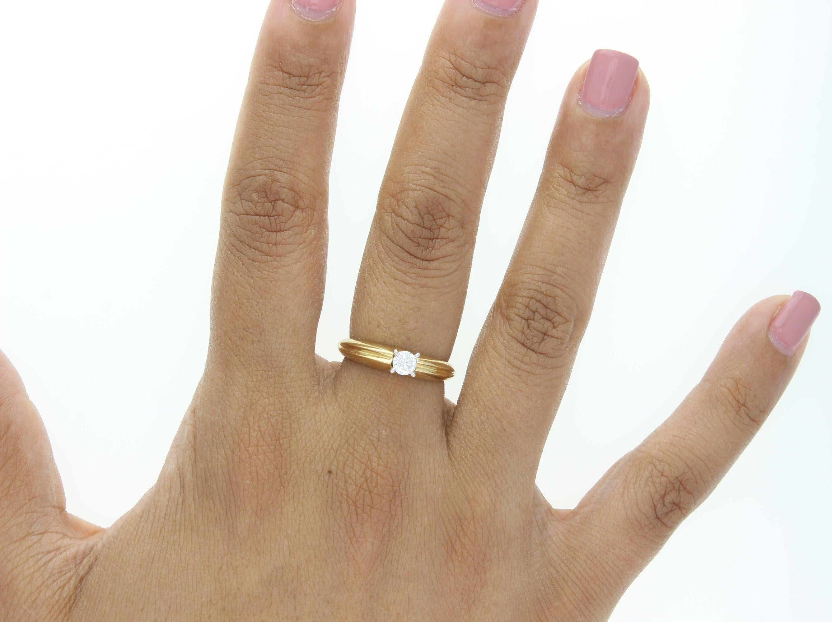 One Quarter Carat Diamond Engagement Ring