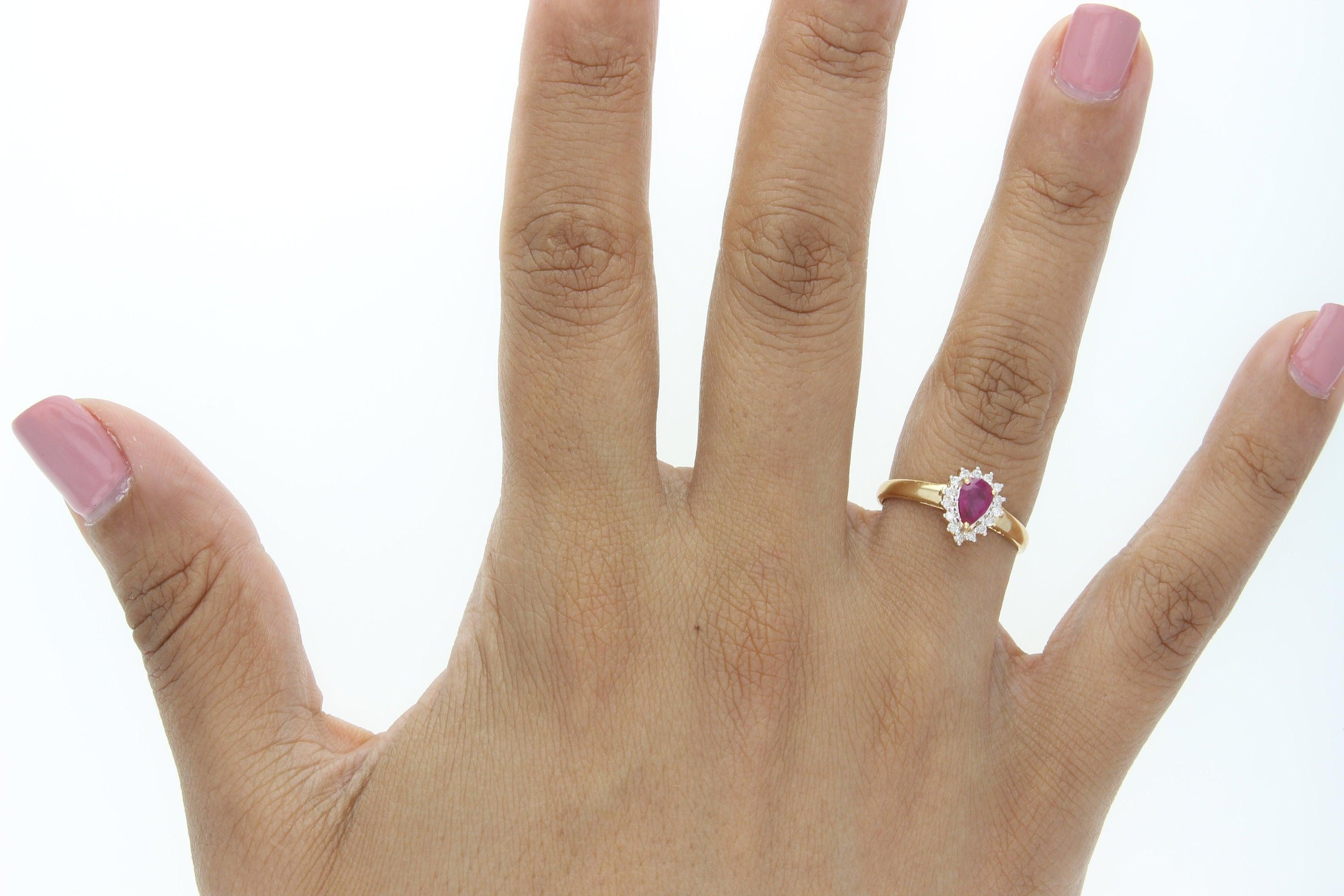 Pear Shaped Ruby Diamond Halo Ring