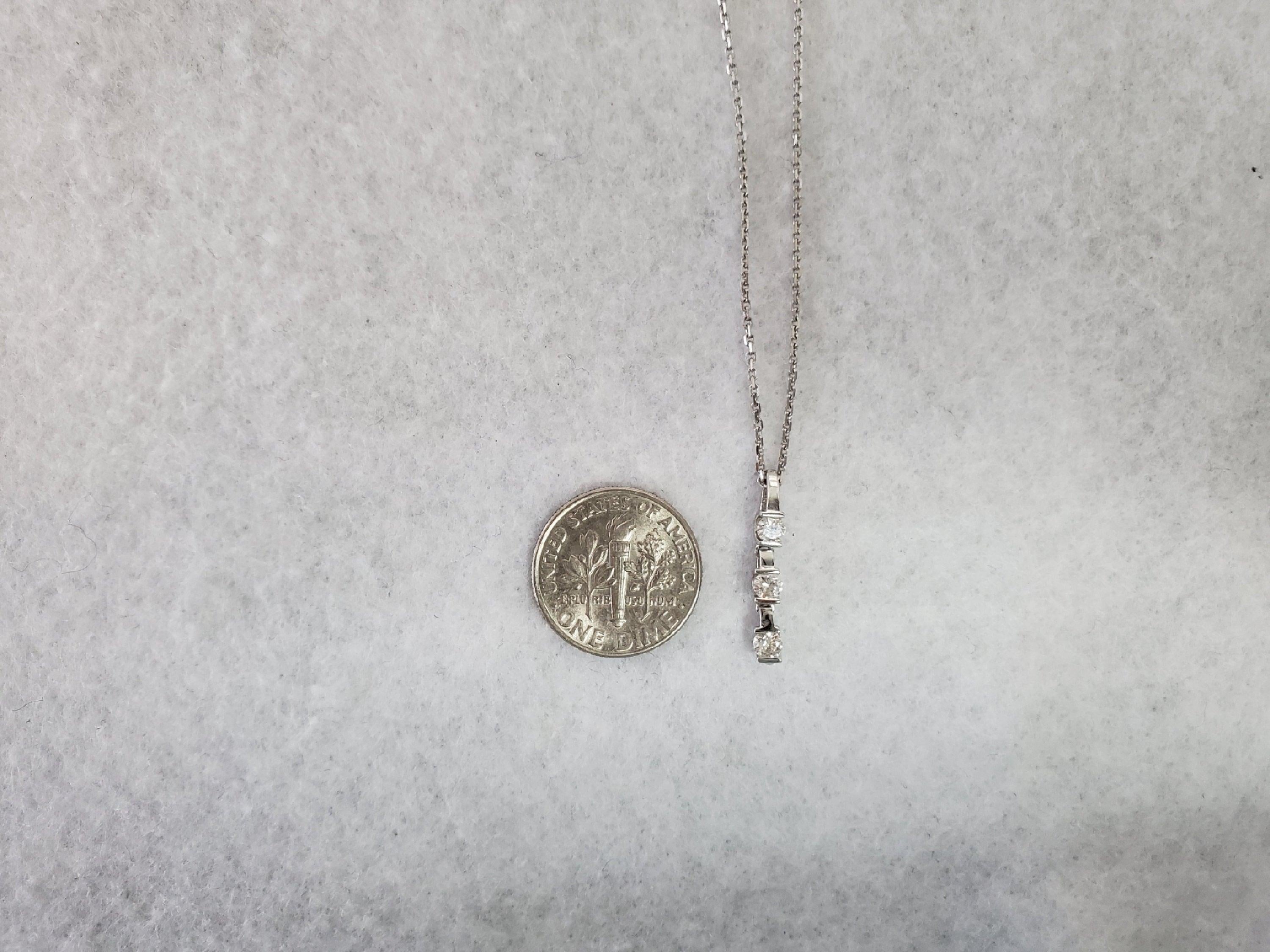 Three Stone Vertical Pendant .26cttw 18k White gold