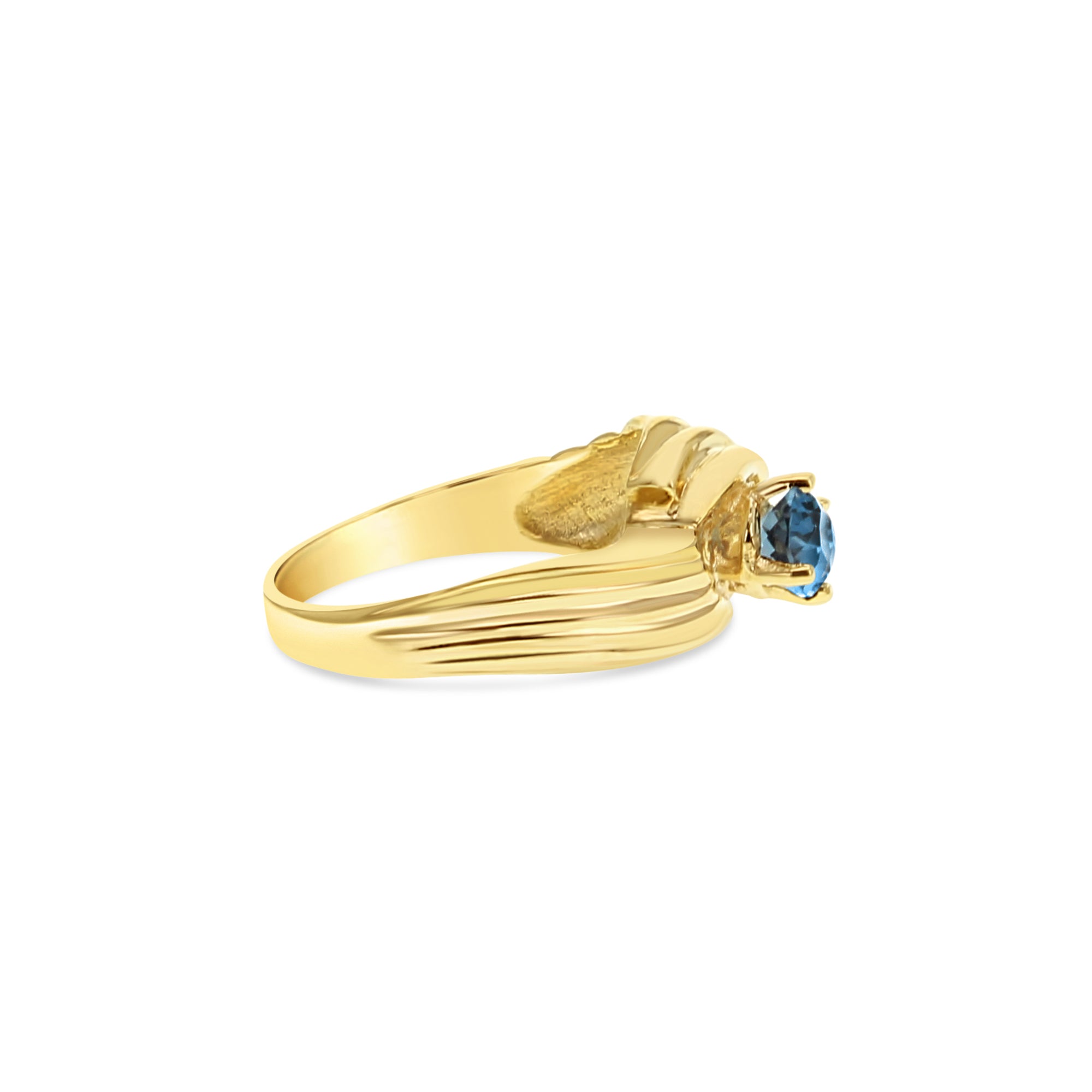 Anillo de topacio azul Londres ovalado en oro amarillo de 14 k