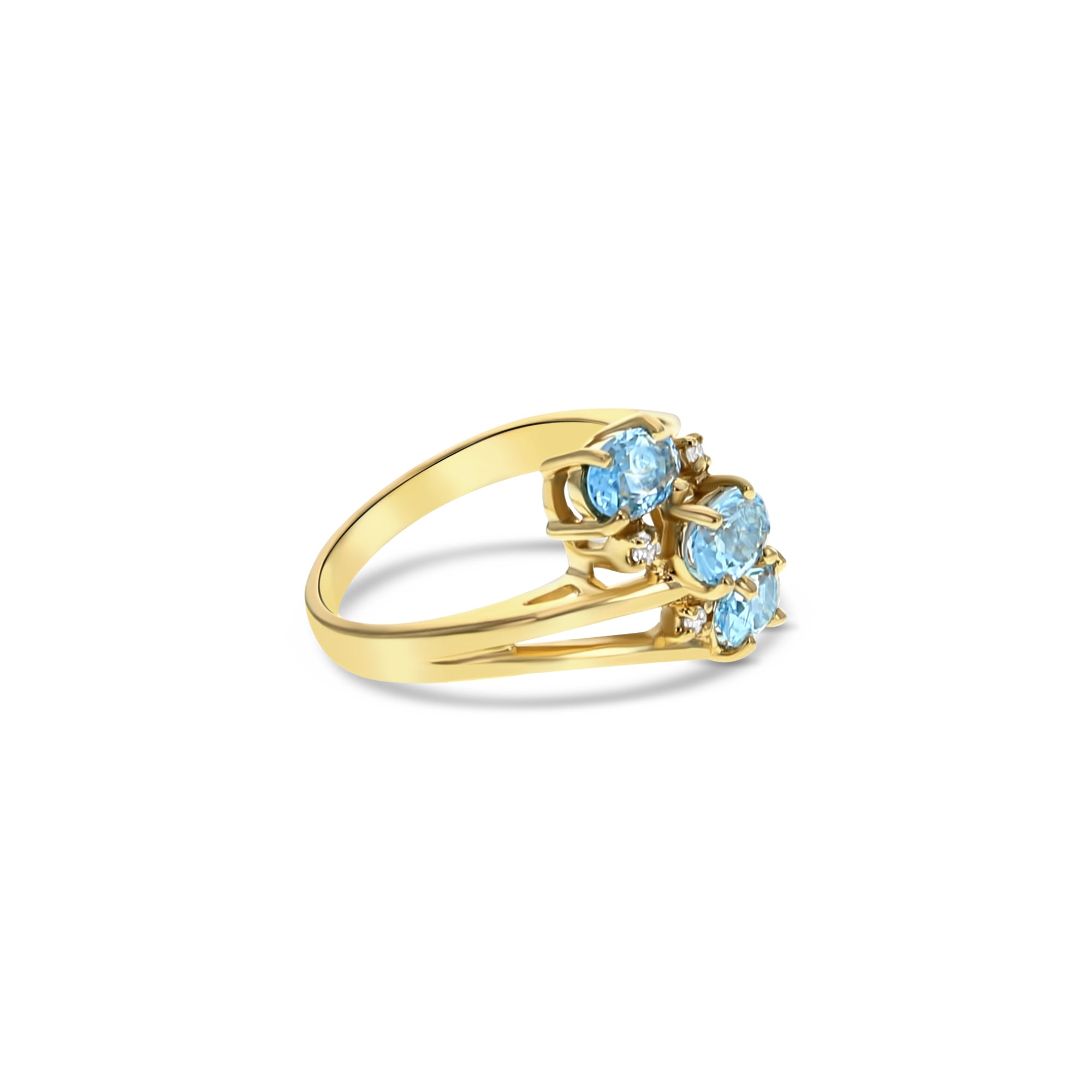 Anillo de diamantes con topacio azul ovalado en oro amarillo de 14 k