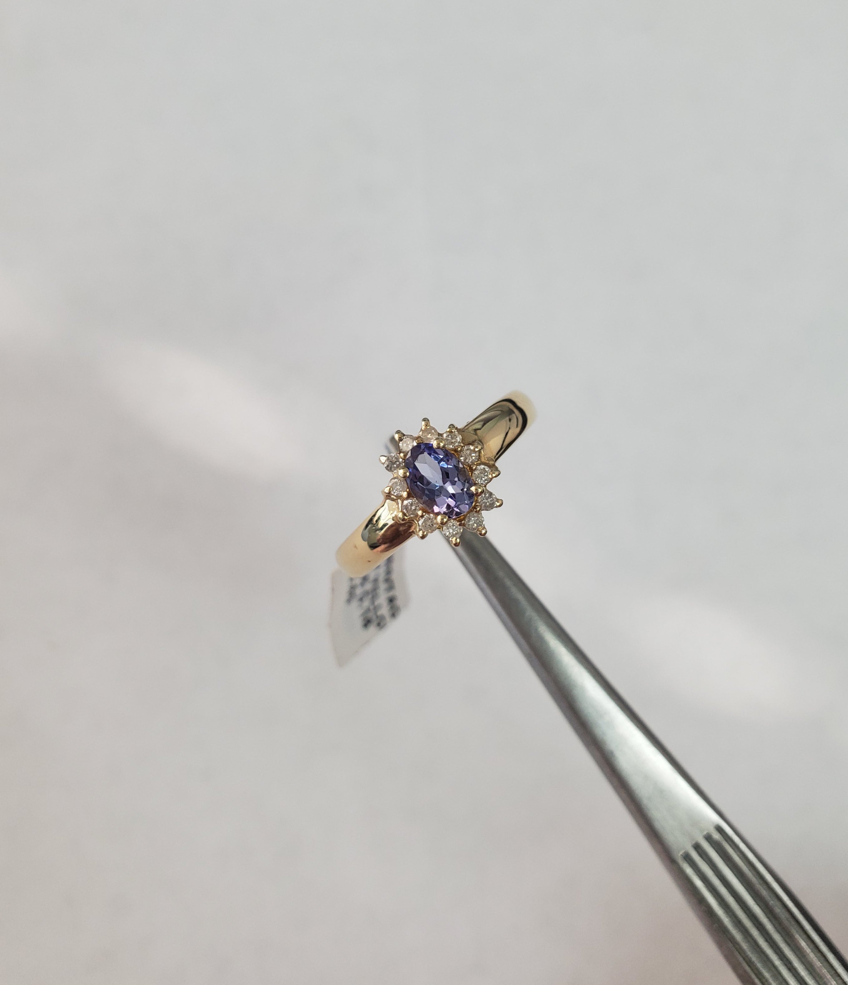 Tanzanite Diamond Halo Ring .61cttw 14k Yellow Gold