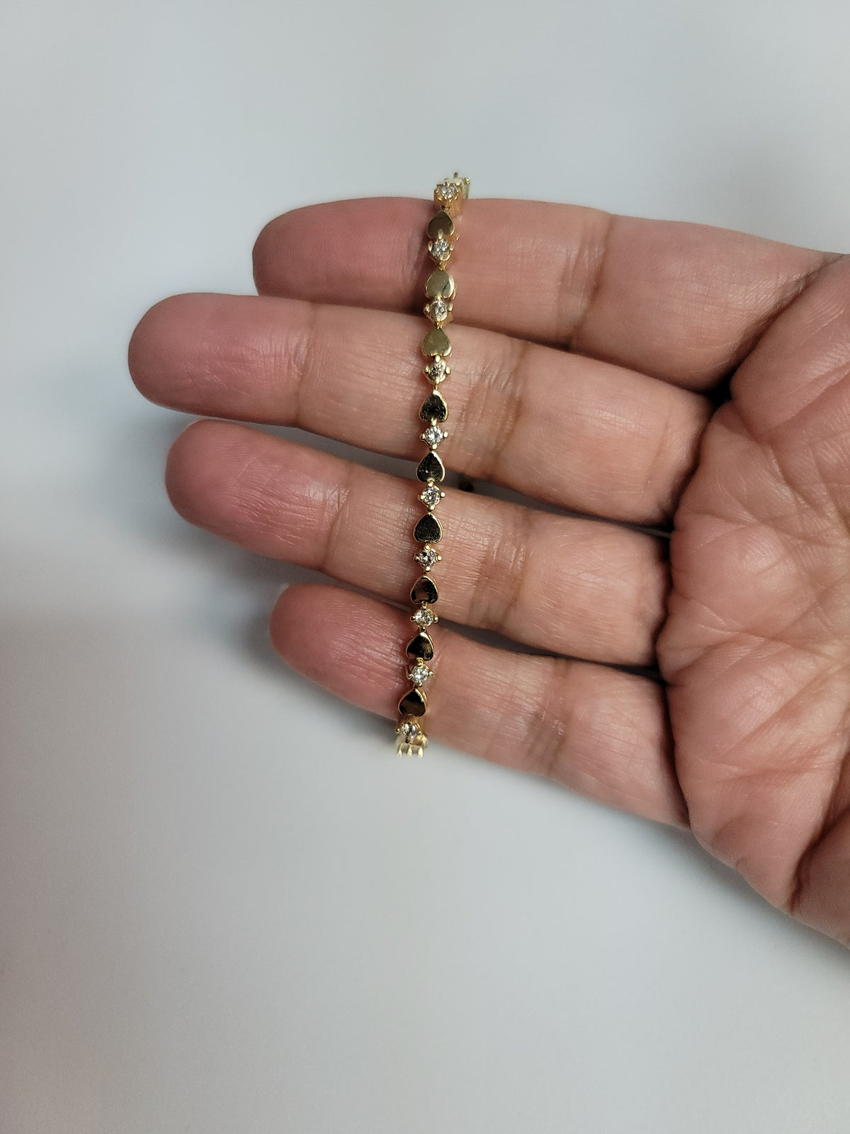 Bracelet tennis en or jaune 14 carats avec diamants en forme de cœur