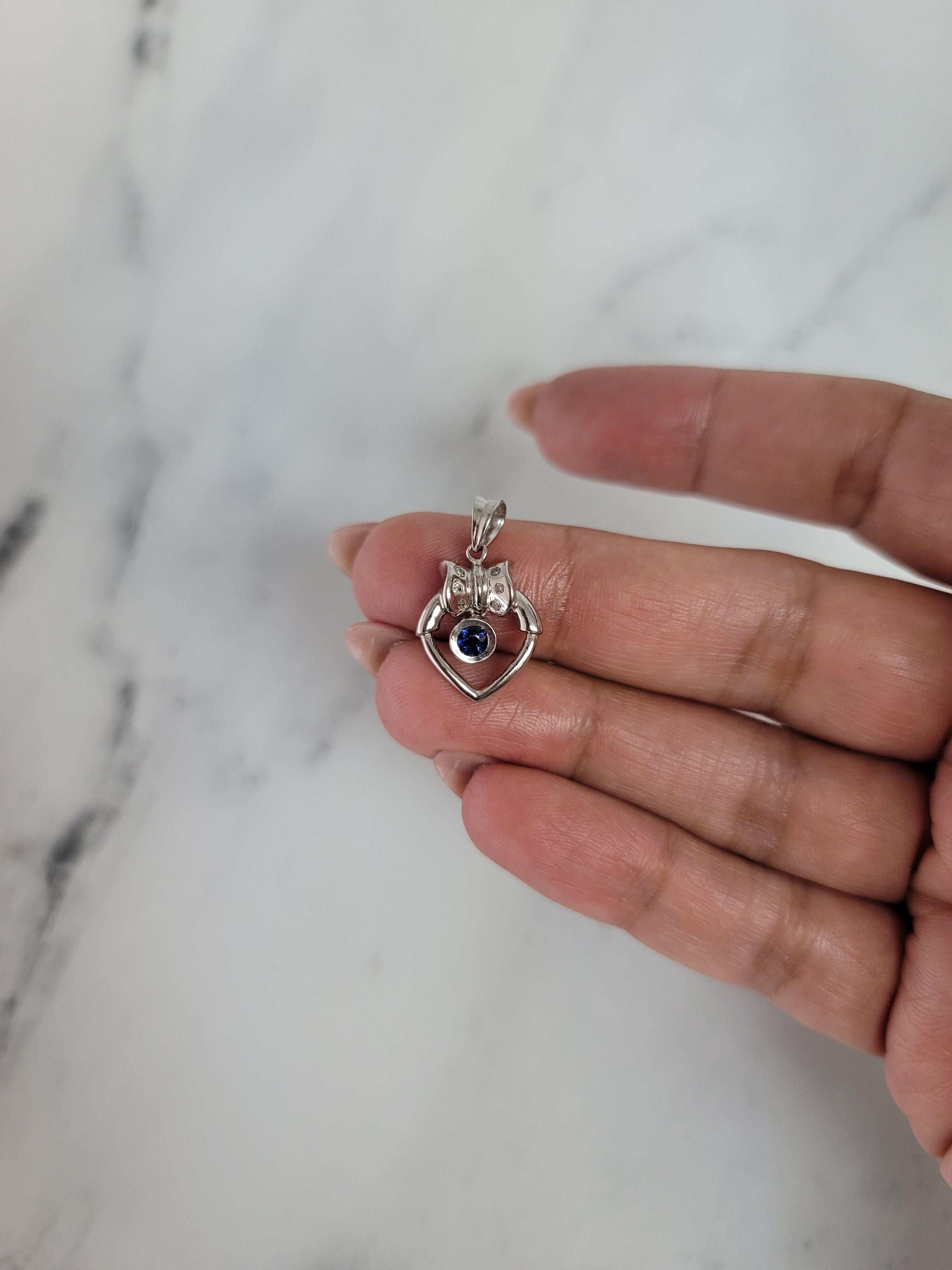 Heart Shaped Necklace with Sapphire Center & Bow Accent 14k White Gold