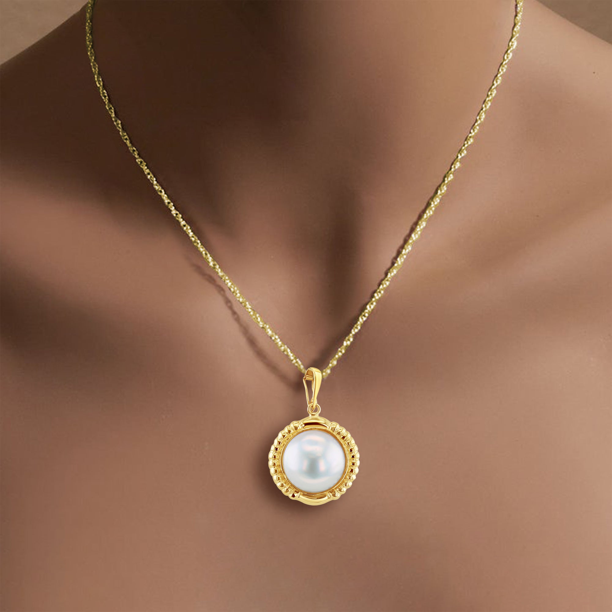 Mabe Pearl Necklace with Ridged Gold Bezel