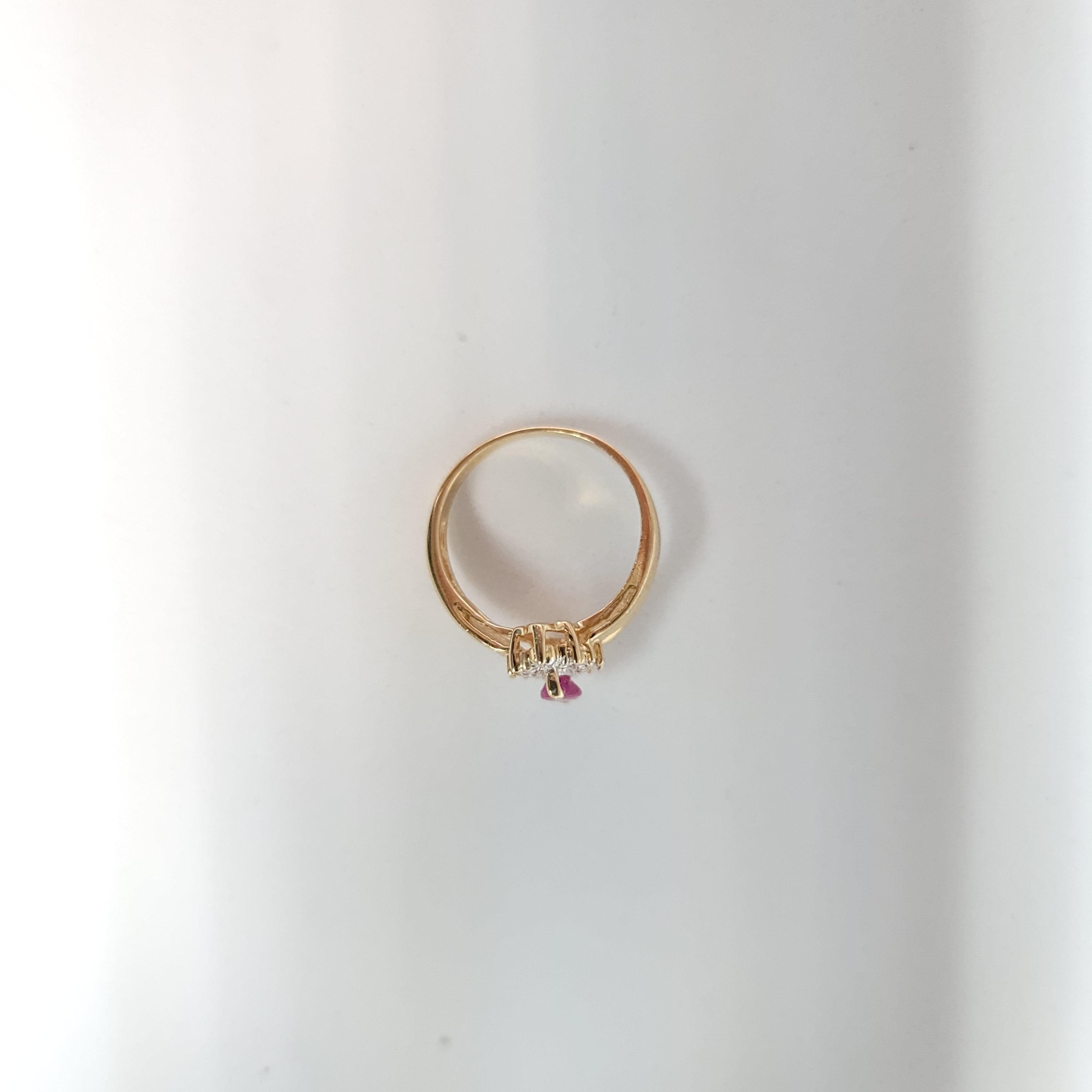 Marquise Ruby Center with Diamond Halo Ring