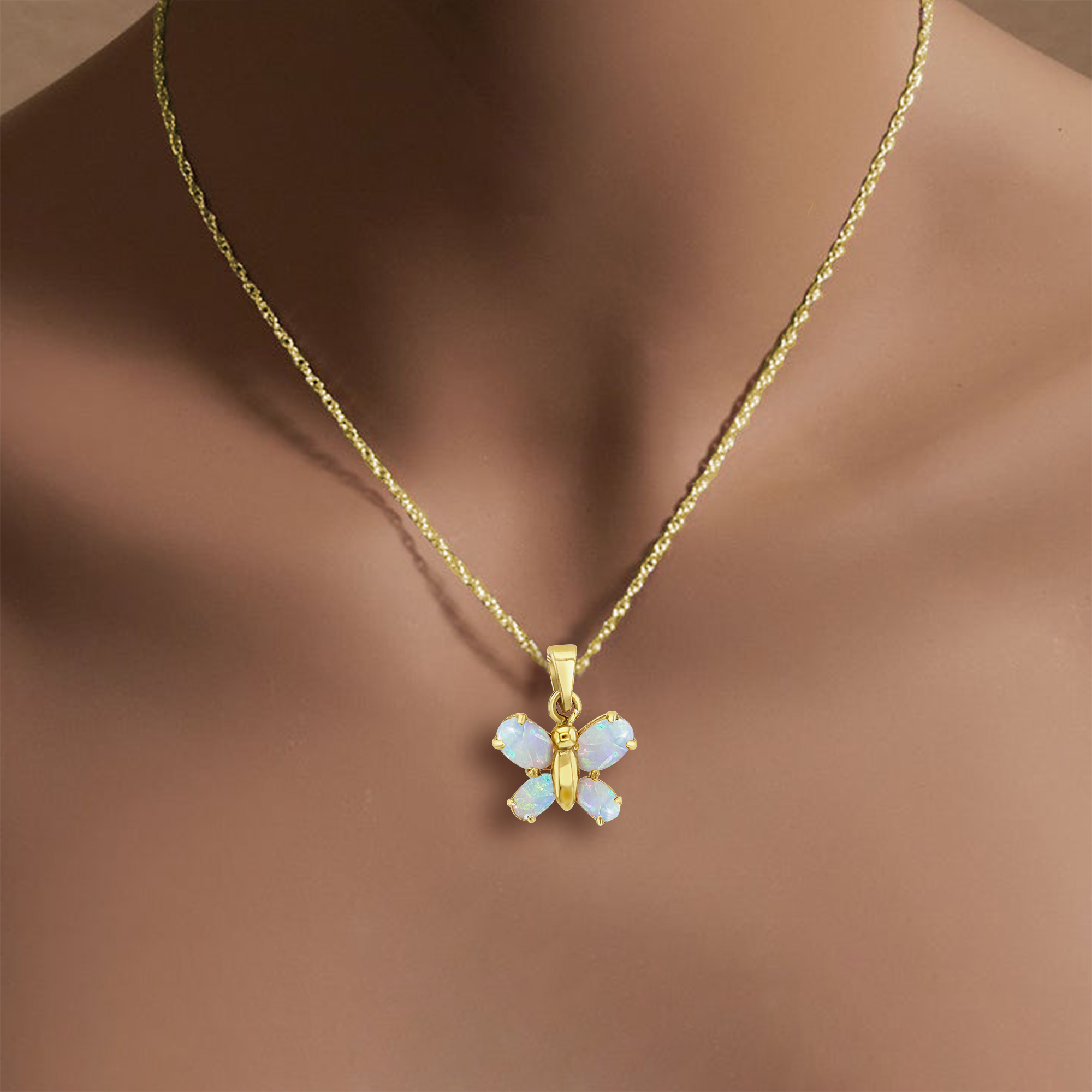 Collar de mariposa de ópalo en oro amarillo de 14 k