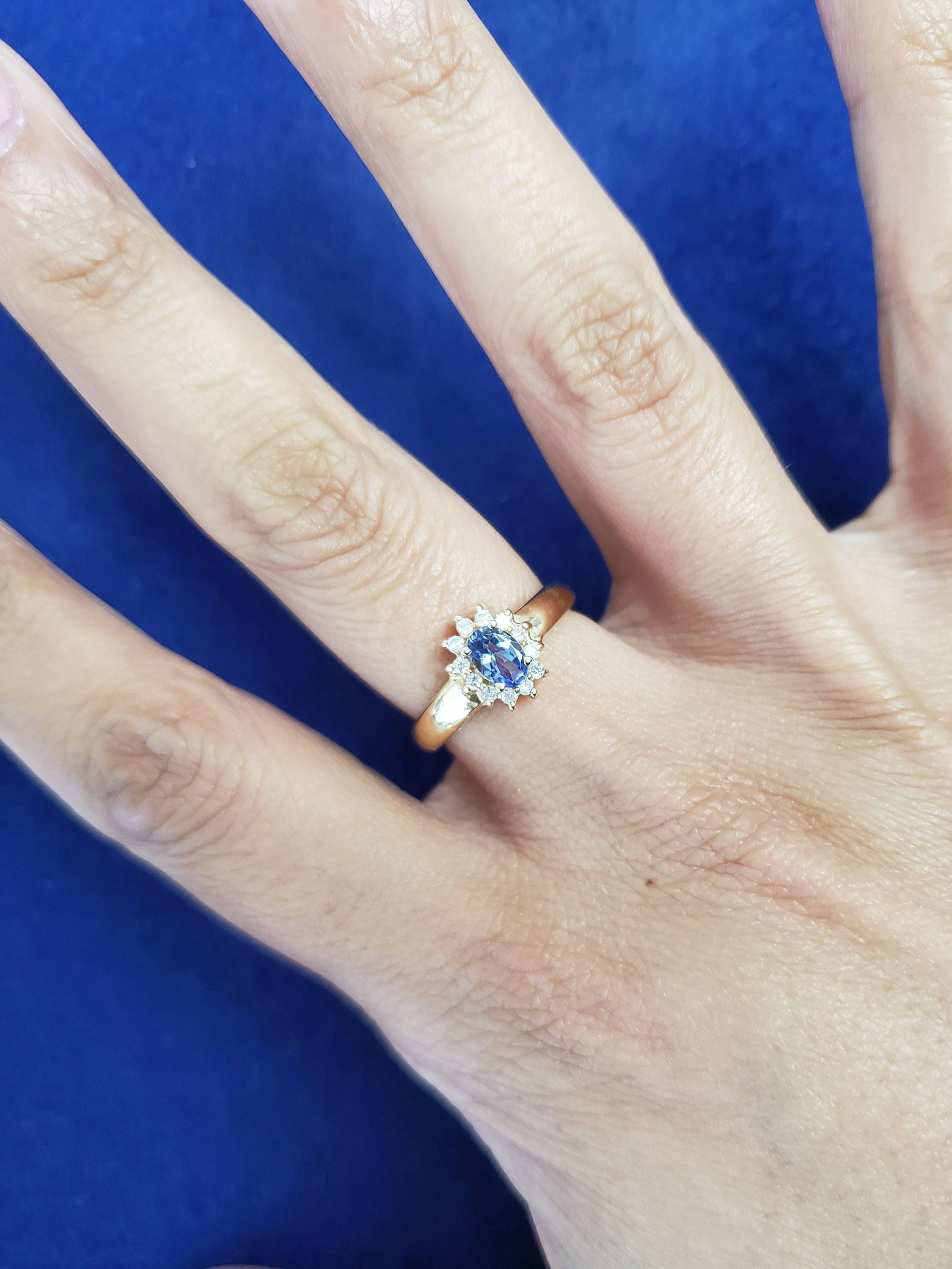 Tanzanite Diamond Halo Ring .61cttw 14k Yellow Gold