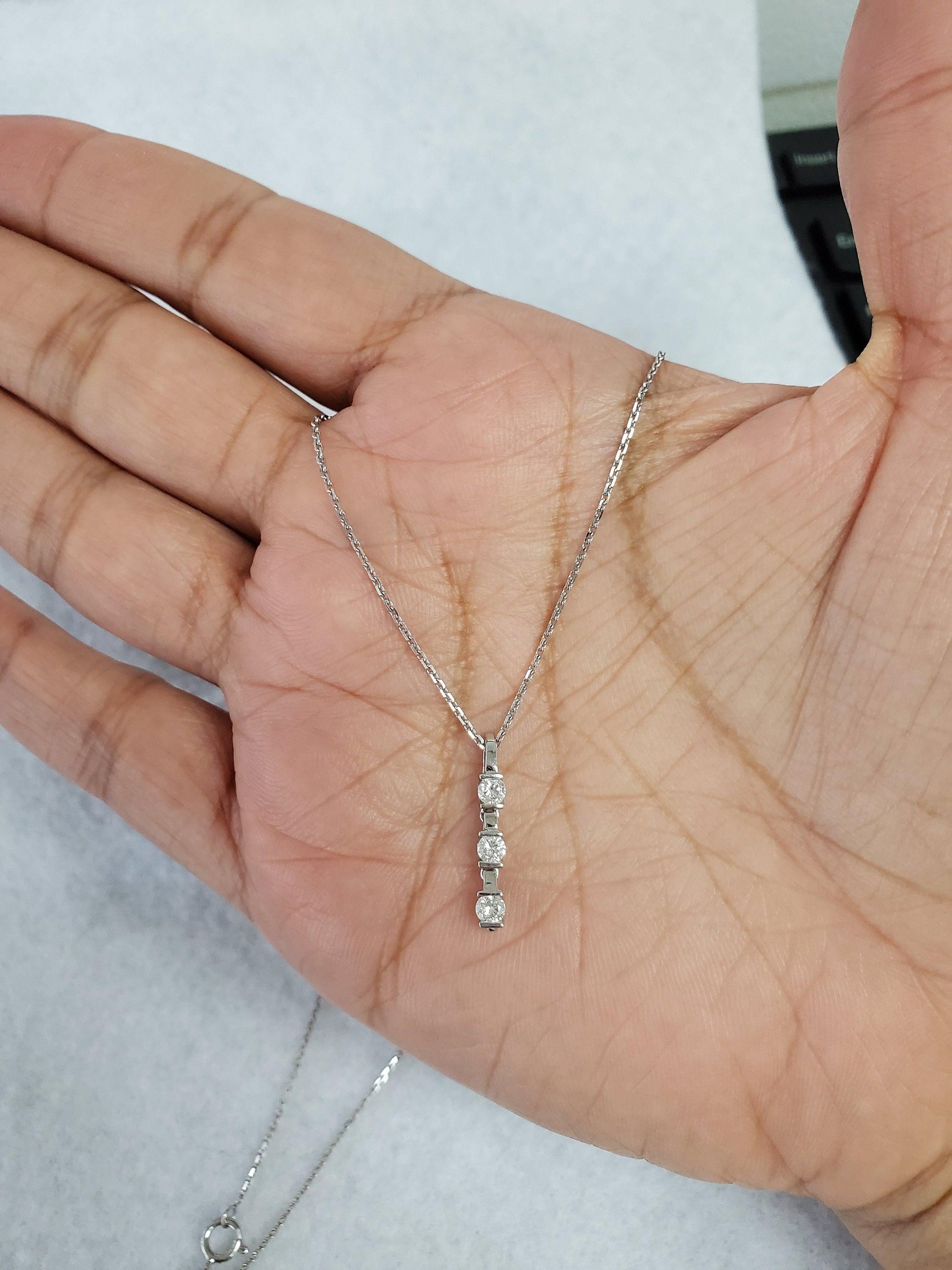 Three Stone Vertical Pendant .26cttw 18k White gold