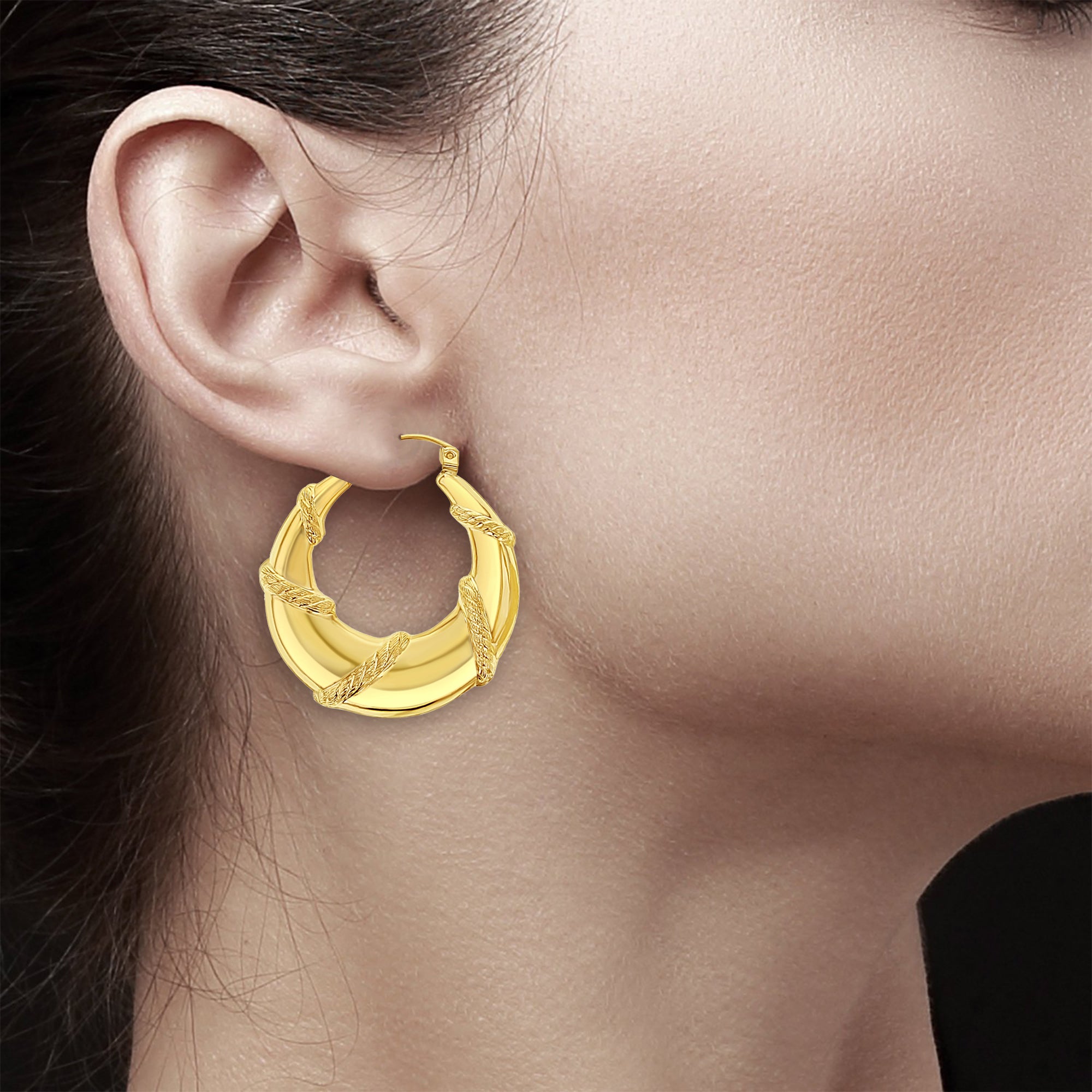 Aros de oro pulido entrelazados con cuerdas en oro amarillo de 14 k