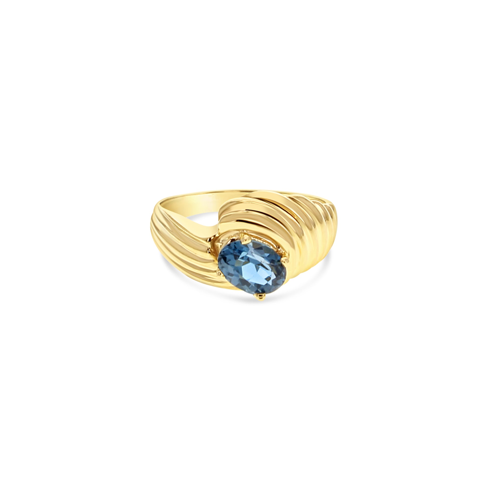 Bague en or jaune 14 carats avec topaze bleue de Londres ovale