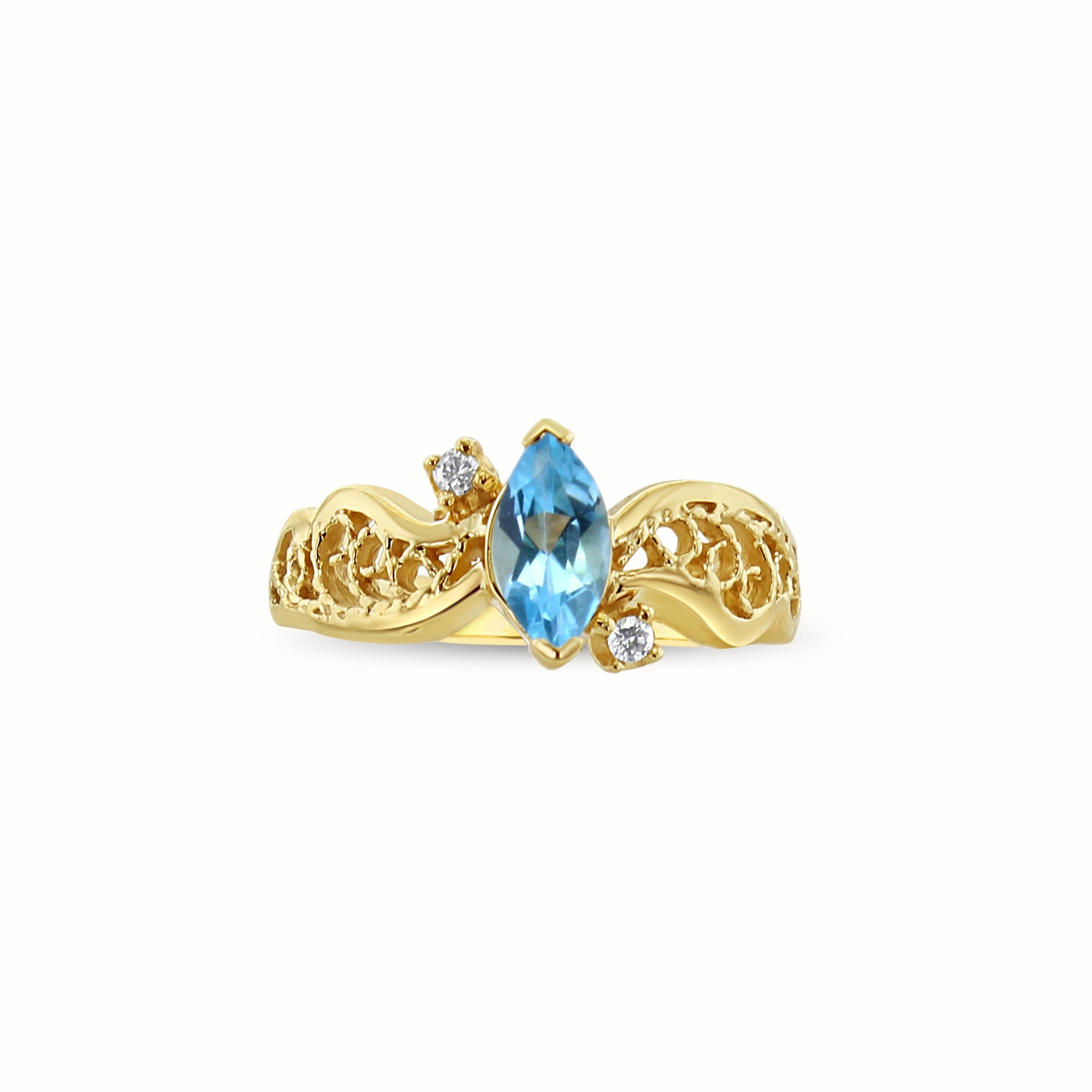 Anillo de topacio azul marquesa con detalles de diamantes en oro amarillo de 14 k