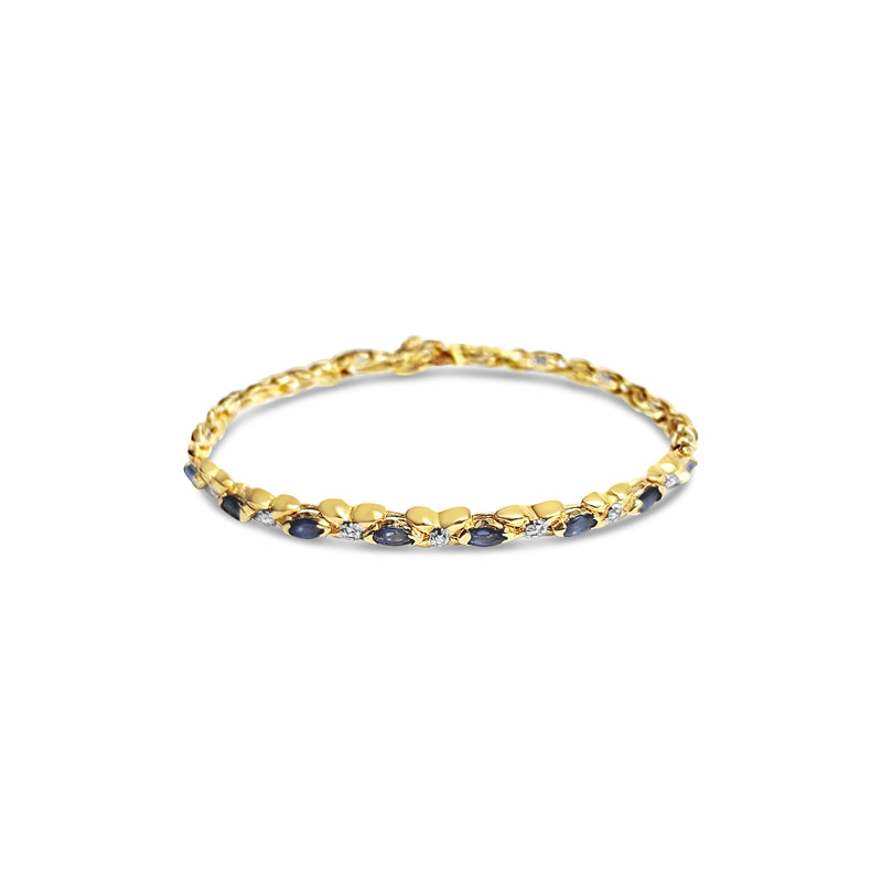 Pulsera de tenis con eslabones en forma de X de diamantes y zafiro marquesa