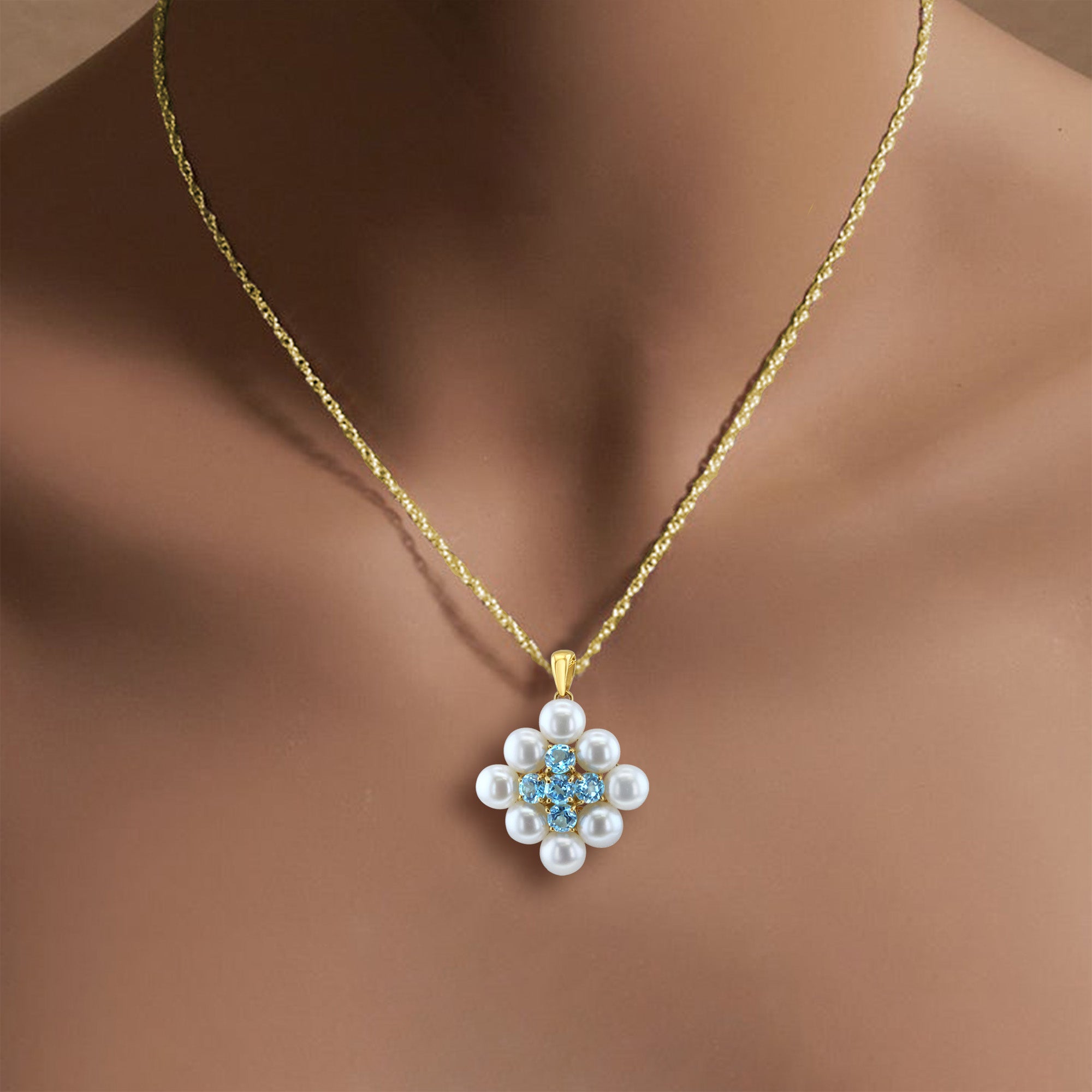 Collar de topacio azul y perlas de agua dulce en oro amarillo de 14 k