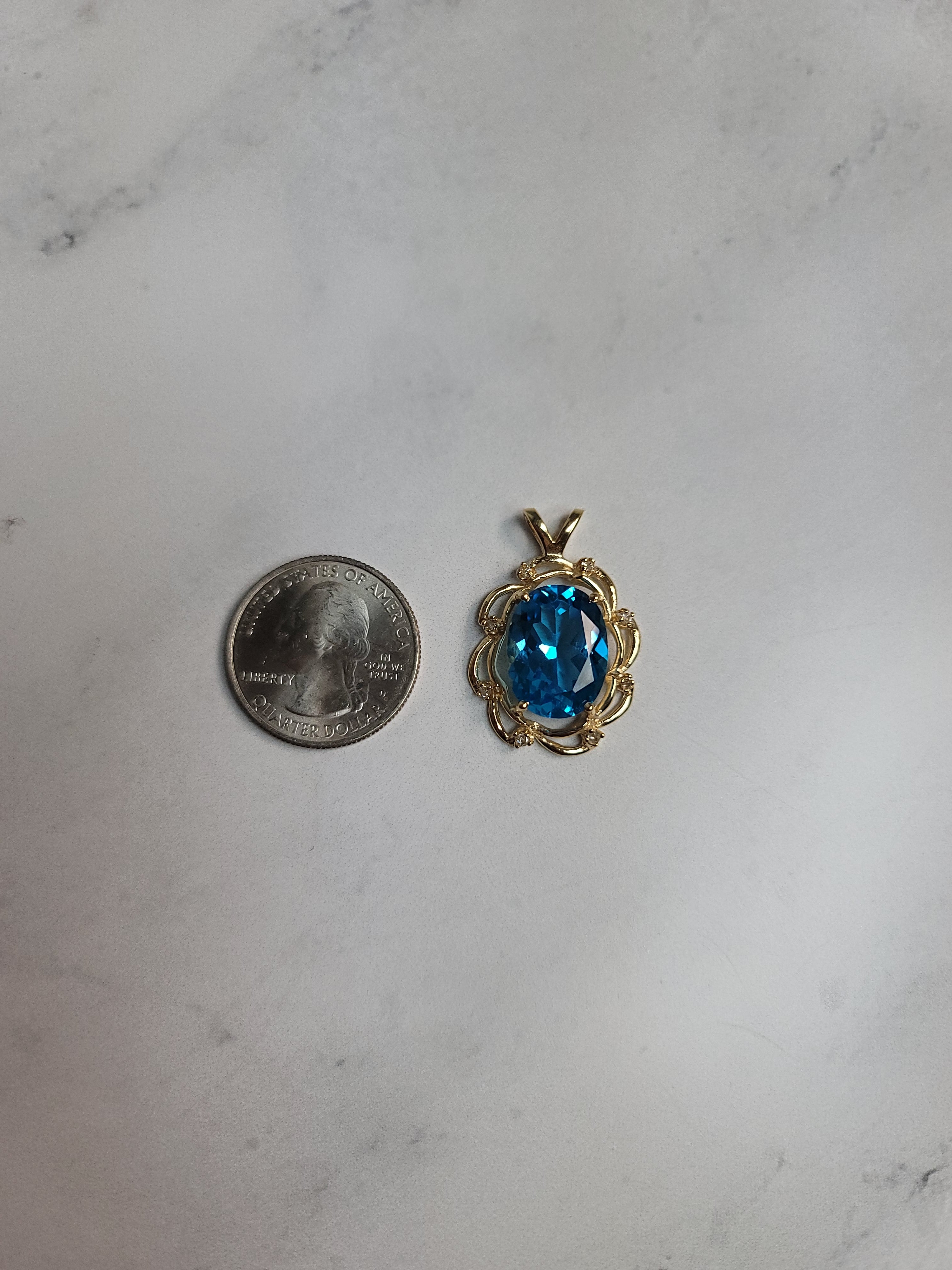 Oval Blue Topaz with Diamond Accents 14k Yellow Gold