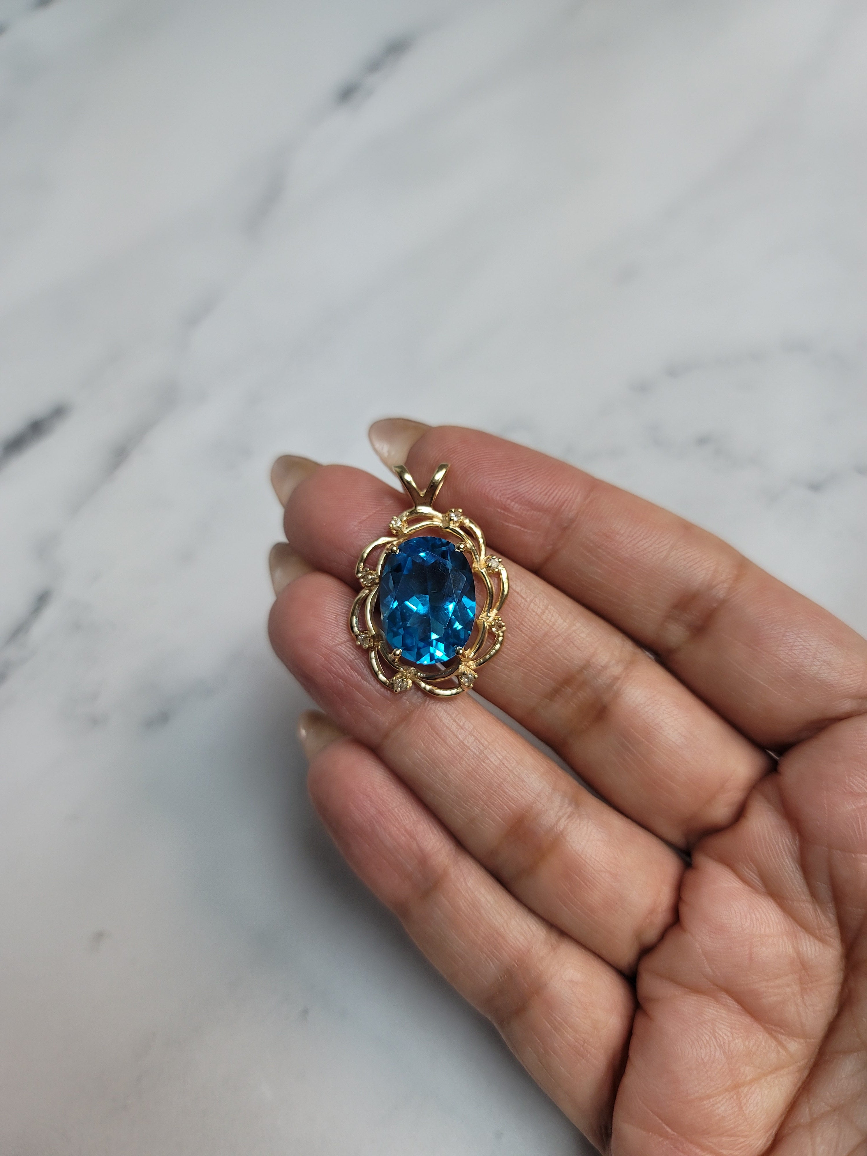 Oval Blue Topaz with Diamond Accents 14k Yellow Gold