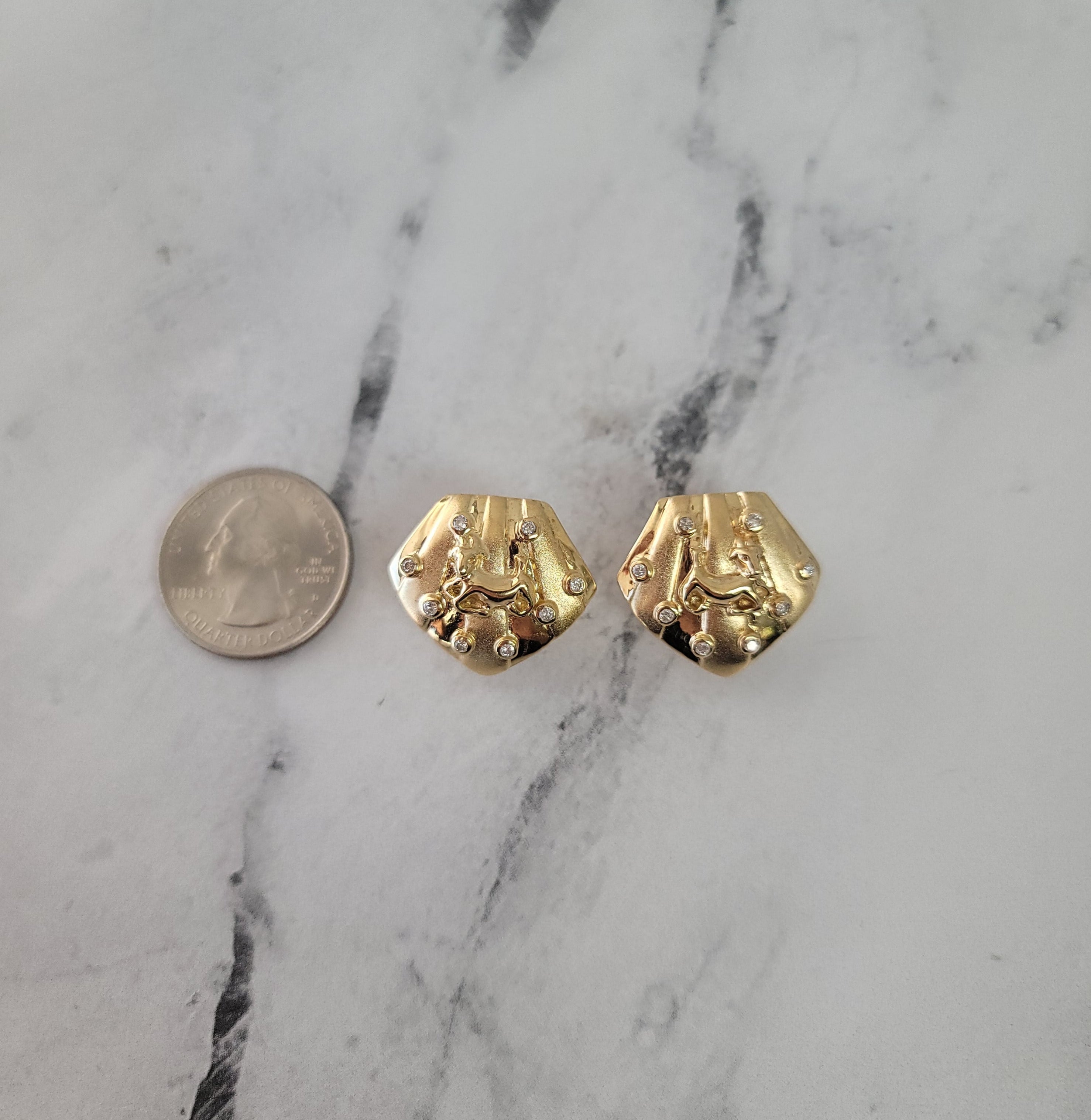 Seashell Shaped Earrings with Dog Design .32ttw 14k Yellow Gold