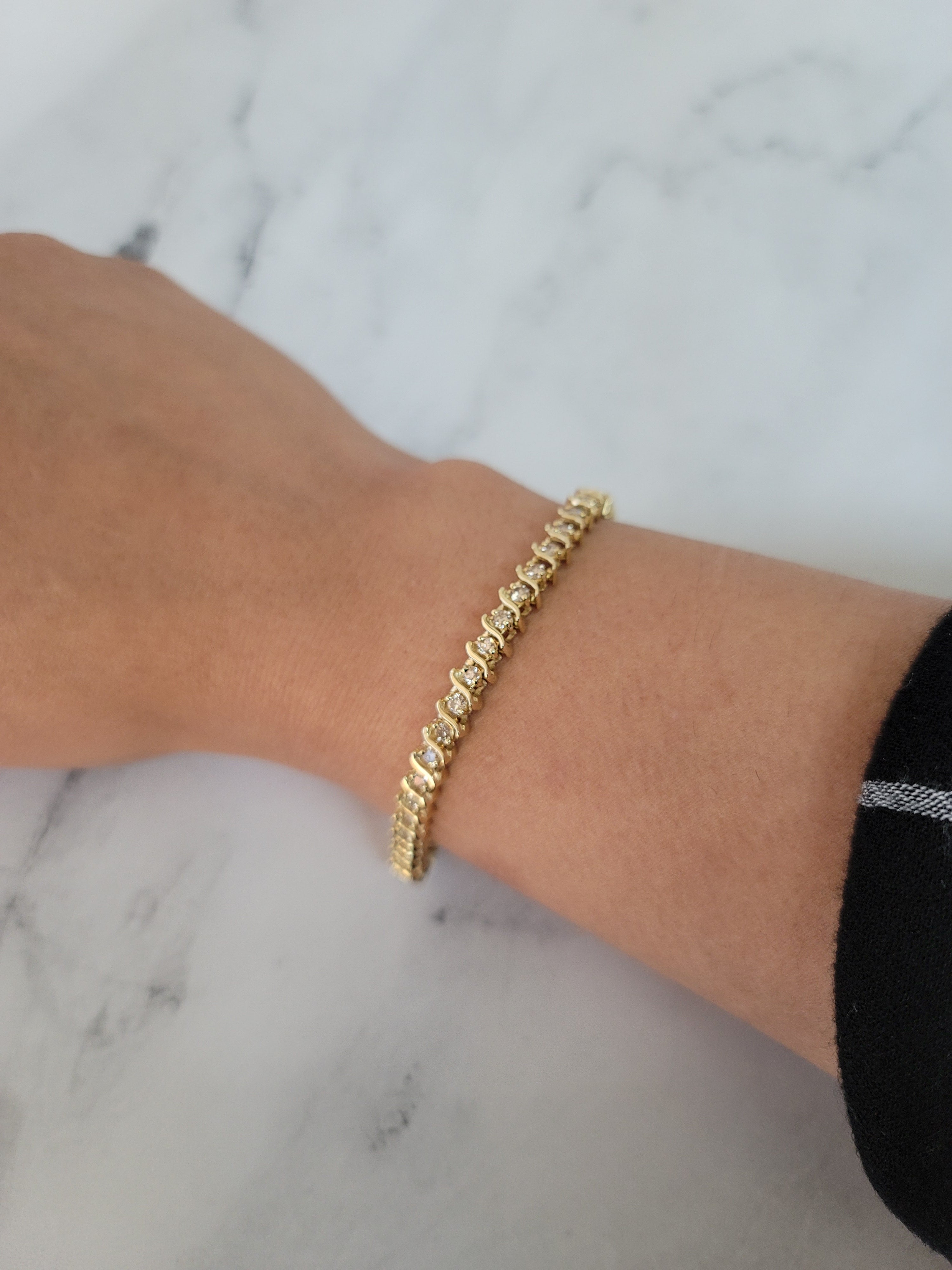 Bracelet de tennis style S 3 carats en or jaune 14 carats