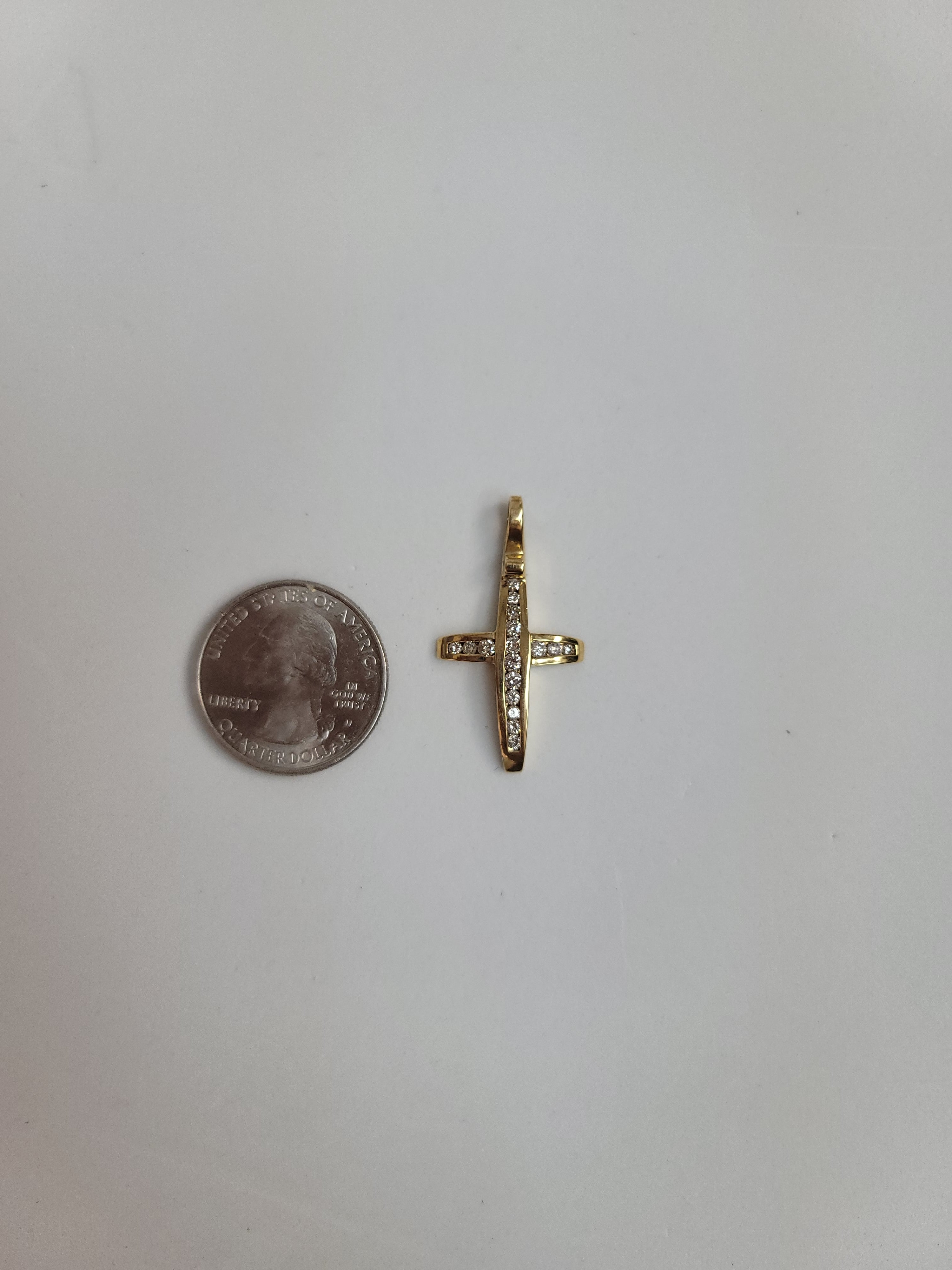 Channel Set Diamond Cross .57cttw 14k Yellow Gold