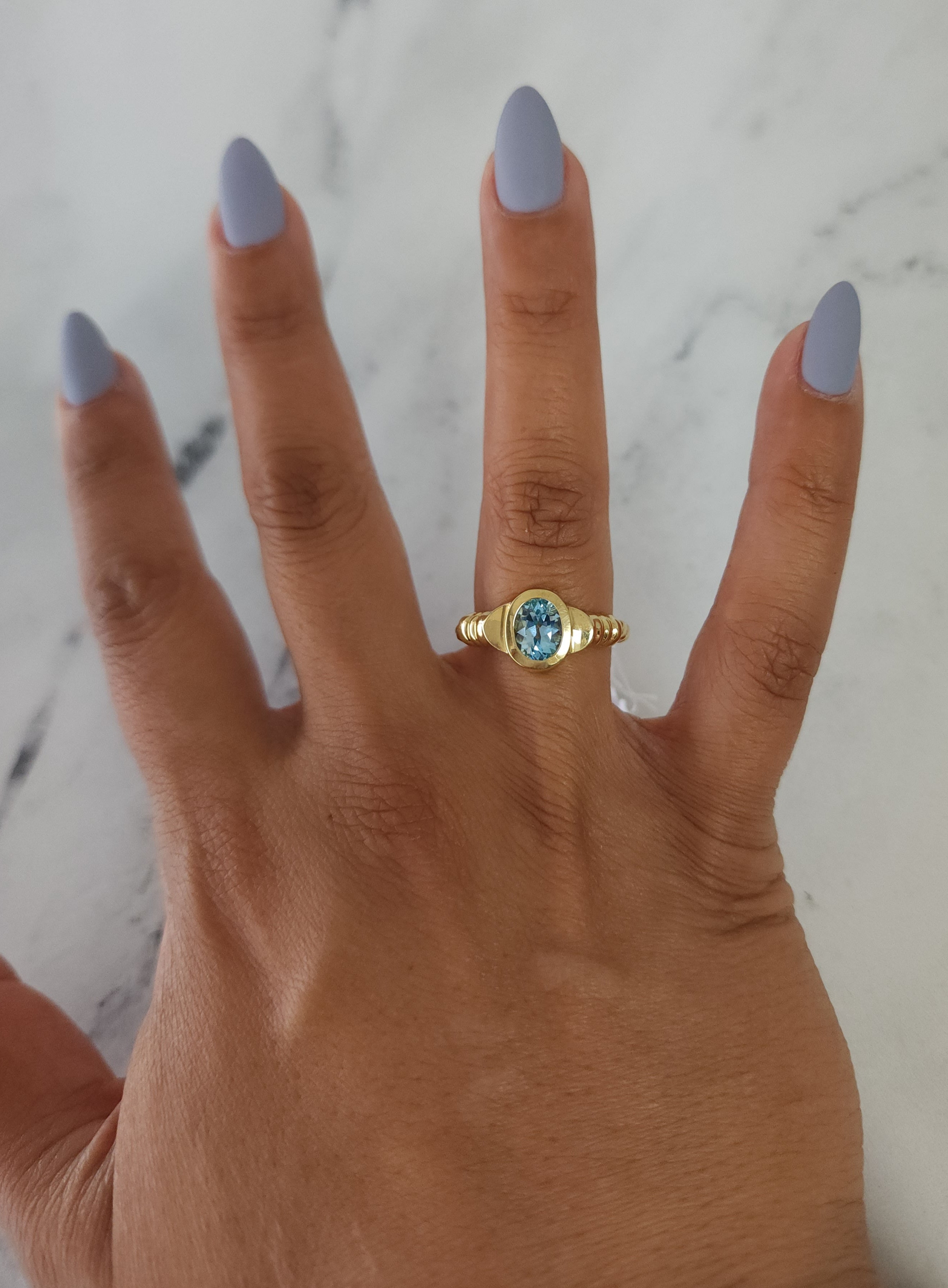 Oval Blue Topaz Solitaire Ring 14k Yellow Gold