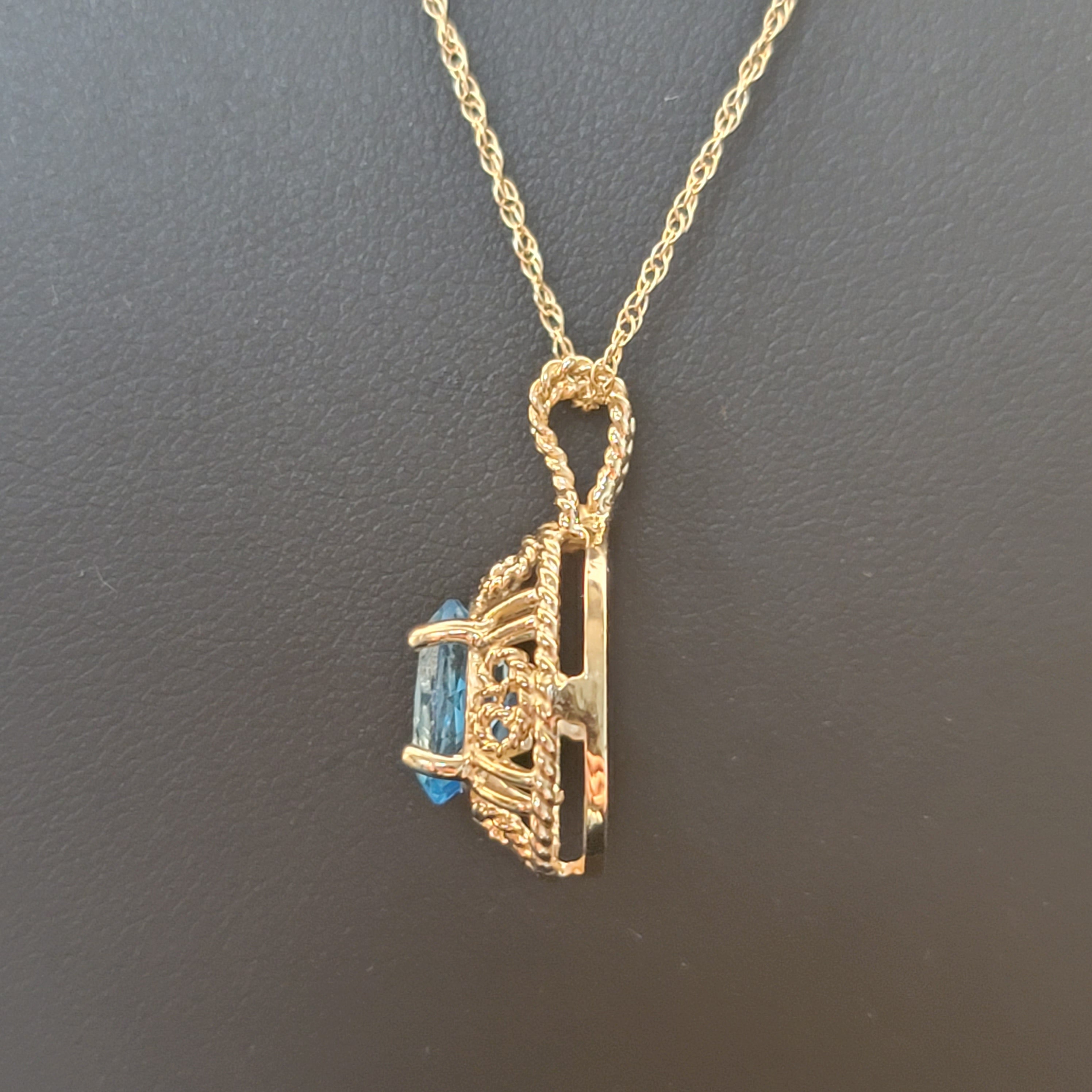 Blue Topaz with Rope Design Necklace 14k Yellow Gold