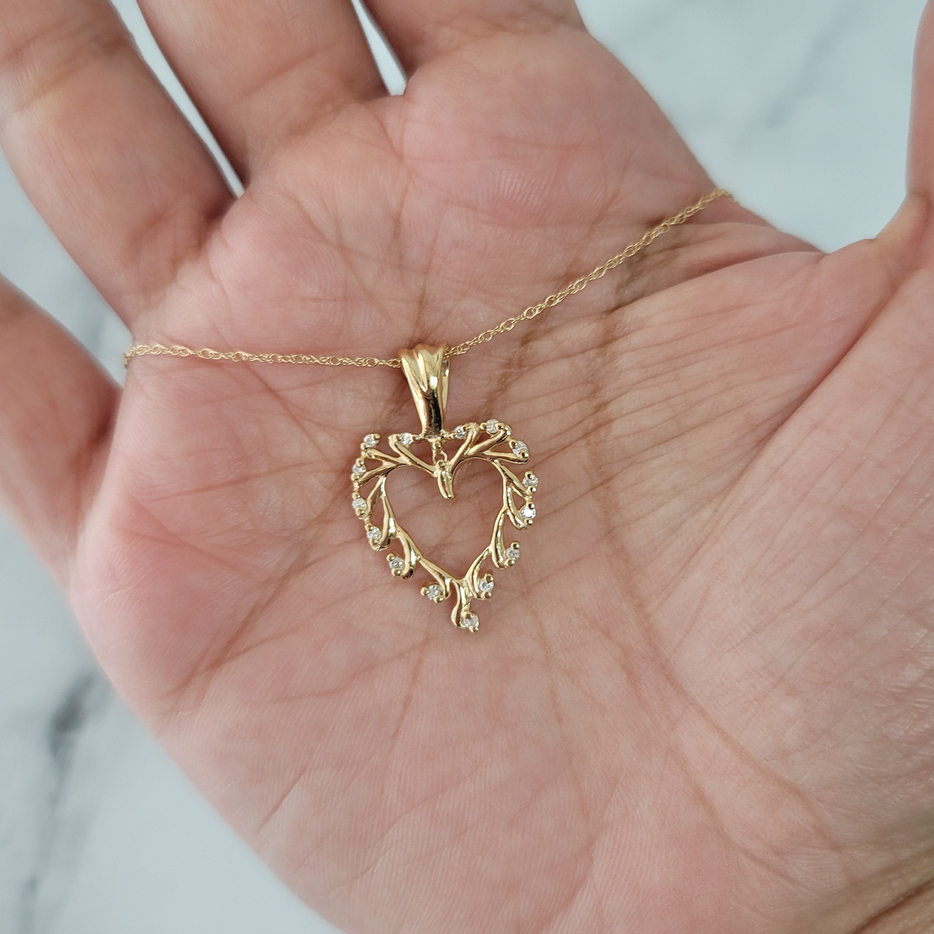 Heart Shaped Cutout Diamond Necklace with leaf design .18cttw 14k Yellow Gold