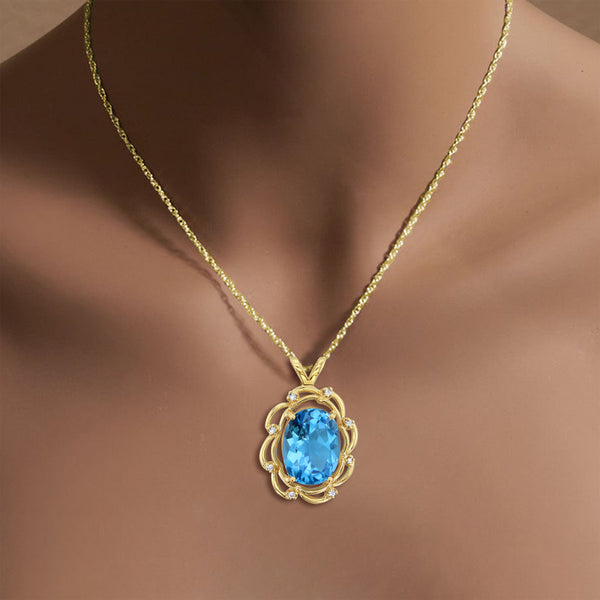 Oval Blue Topaz with Diamond Accents 14k Yellow Gold