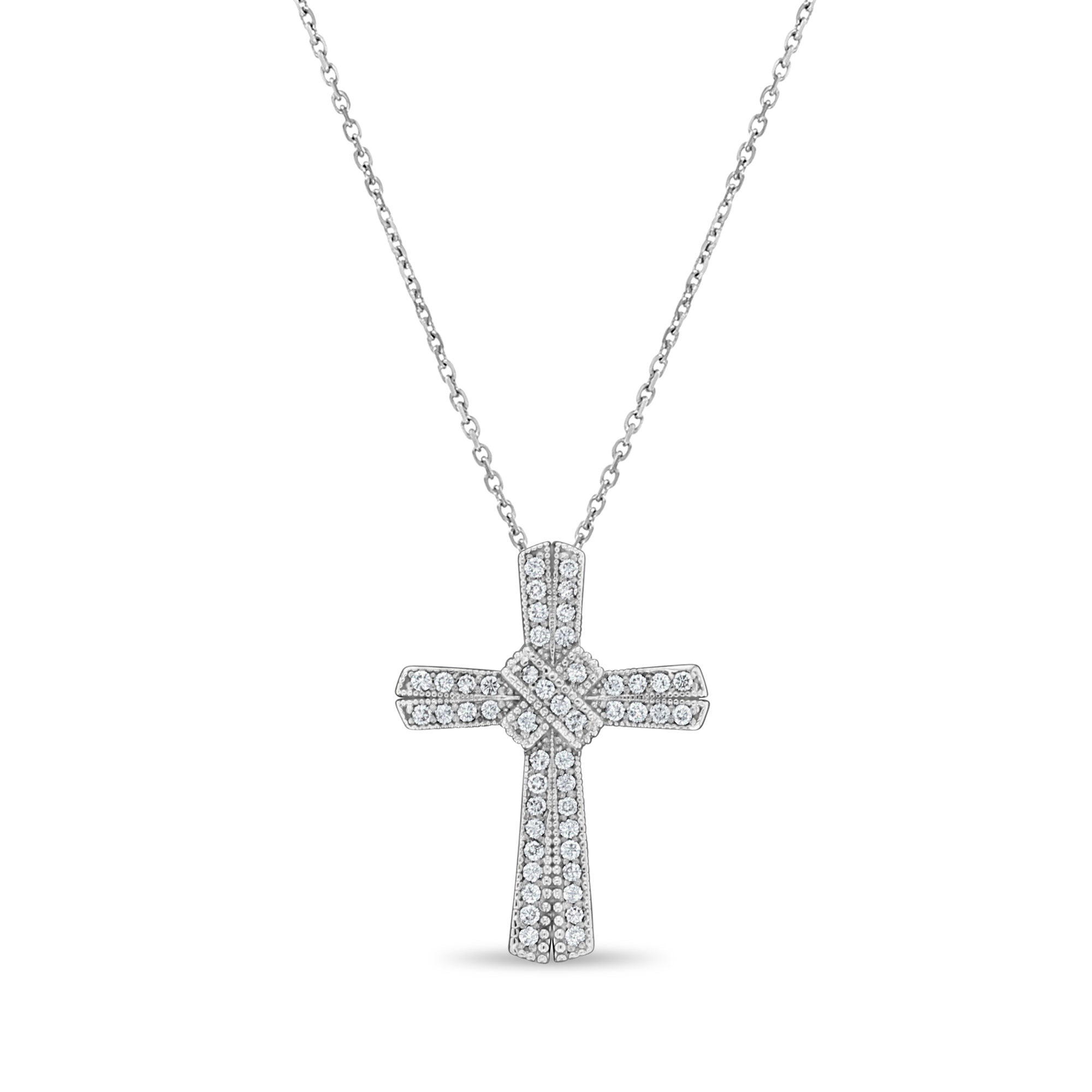 Pendentif croix en diamant 0,68 ct en or blanc 14 carats