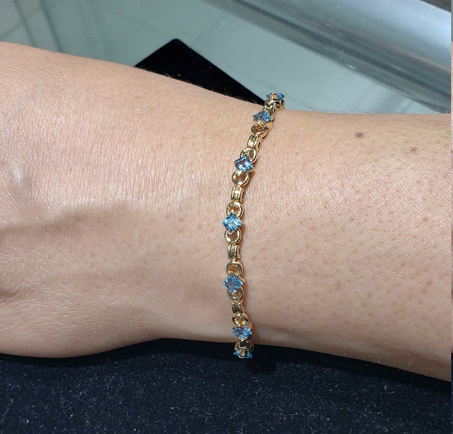 Blue Topaz Tennis Bracelet 1.50cttw 14k Yellow Gold