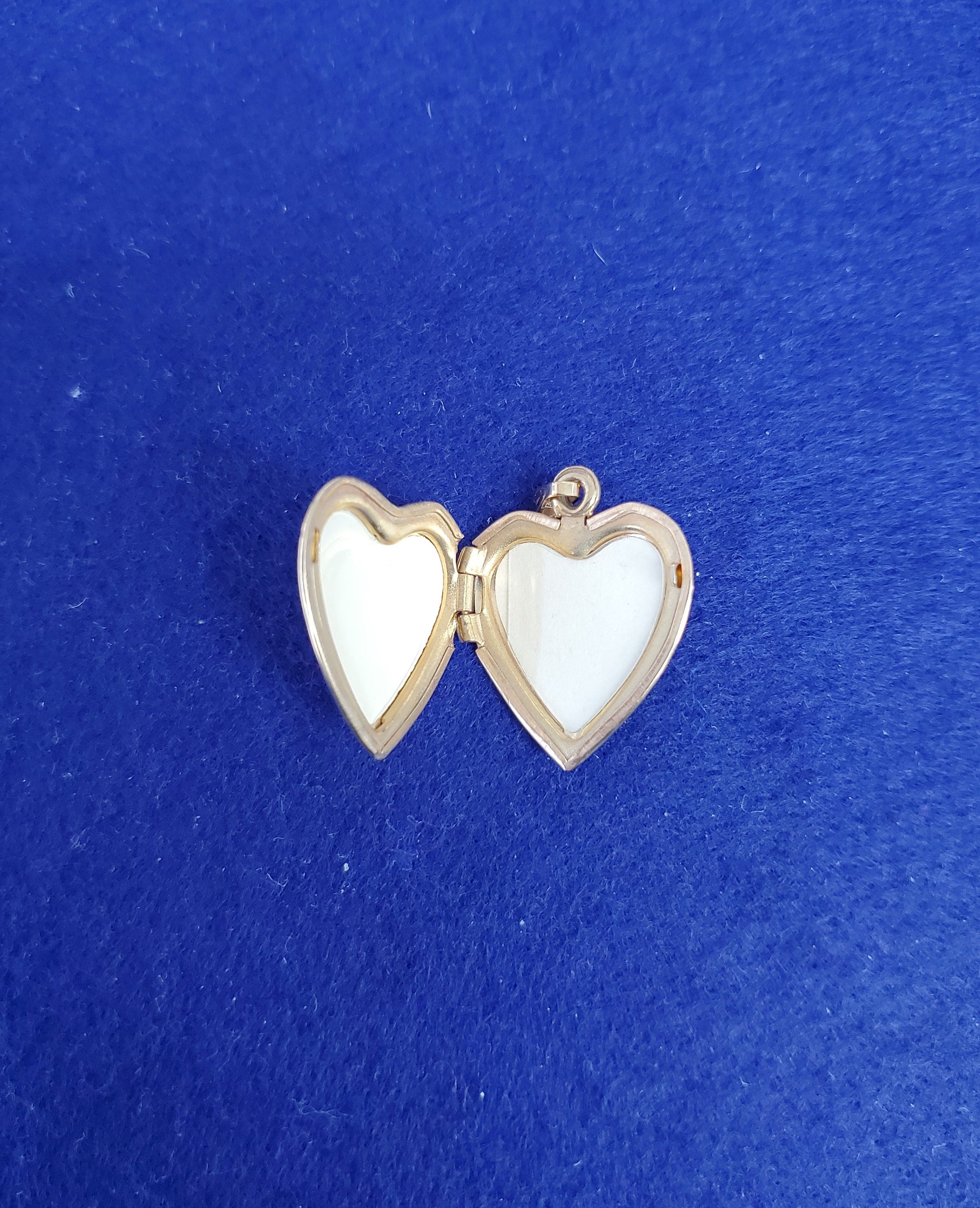 Heart Shaped Locket with Cross & Flower design 14k Yellow Gold